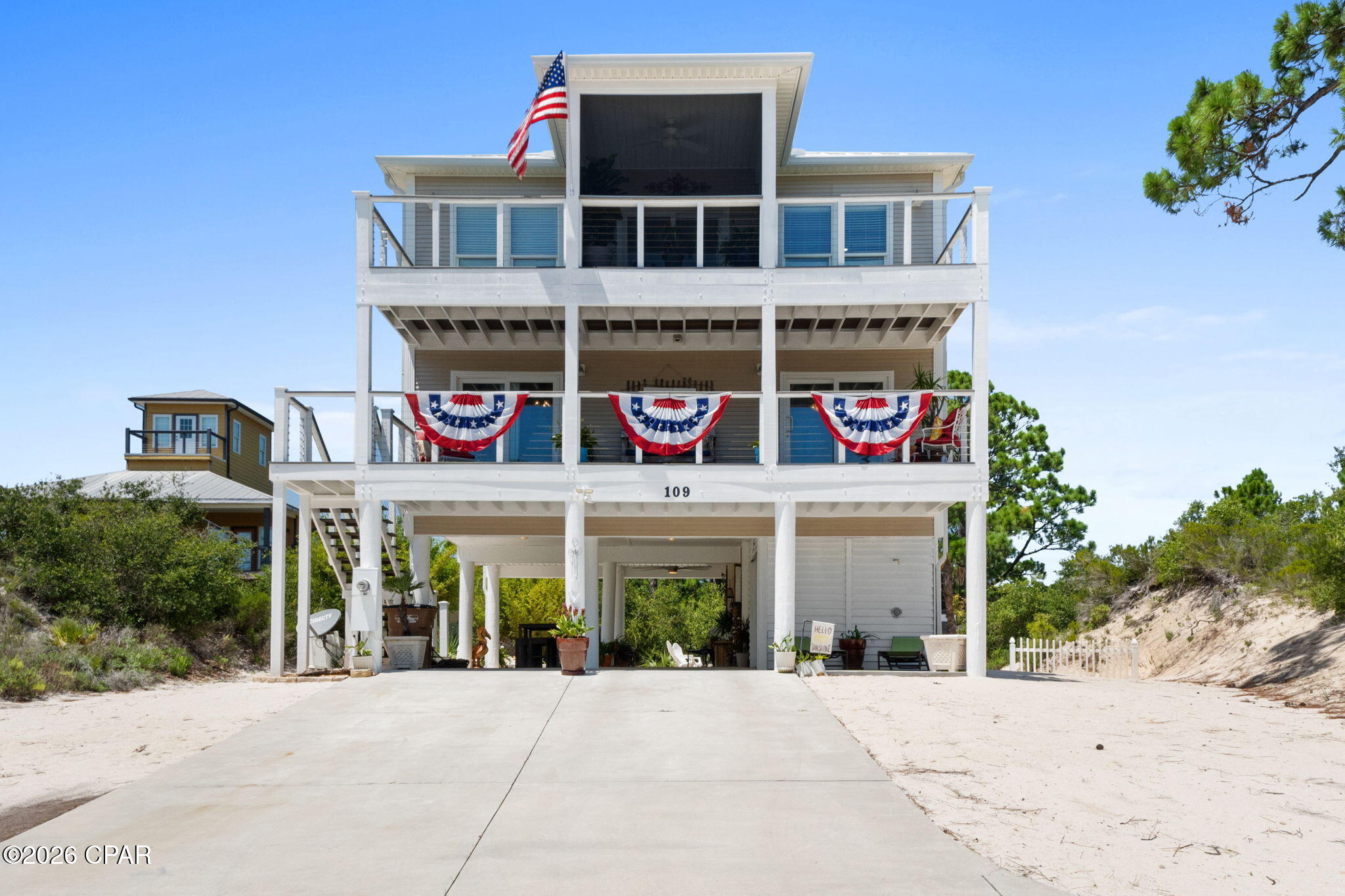 NATURE MEETS LUXURY!!  Nestled among the natural beauty of Cape San Blas, this 3BD/2.5BA tropical oasis offers the perfect balance of privacy, comfort & coastal adventure on the largest lot in the subdivision. Wake each morning to peaceful peek-a-boo bay views from the kitchen window & end your day with spectacular sunsets that paint the sky over St. Joseph Bay. The open-concept main living area is located on the third floor, creating an inviting space for gathering with family & friends while seamlessly flowing onto a spacious screened porch where you can relax with those Gulf views, enjoy the soothing sound of the waves in the evening & embrace the laid-back rhythm of beach life. The second floor features comfortable guest bedrooms & a spacious primary suite with private access to a covered deck for your own quiet retreat. Outside, in your private backyard, paradise awaits a cozy fire pit, tropical landscaping & plenty of room to entertain under the stars after a day on the water. Bay & Gulf access make it easy to enjoy boating, kayaking, fishing, paddleboarding, shelling & endless days exploring the Forgotten Coast. Just minutes away, ride your bike along the scenic Loggerhead Run Bike Trail to Salinas Park where you'll enjoy pickleball courts, playgrounds, picnic areas, bay access & Gulf beaches. The nearby deeded beach access places sugar-white sand & emerald waters within easy reach, while pet-friendly beaches invite every member of the family to join the fun. With no HOA fees, abundant storage for beach gear, boats & outdoor toys, a peaceful neighborhood with very few vacation rentals & a quaint, quiet setting surrounded by nature, this property is ideal as a full-time residence, second home or coastal getaway. Enjoy the best of Cape San Blas where unforgettable sunsets, natural beauty, outdoor recreation & relaxed coastal living come together in one exceptional location. Call for your private tour & LIVE THE BEACH LIFE!