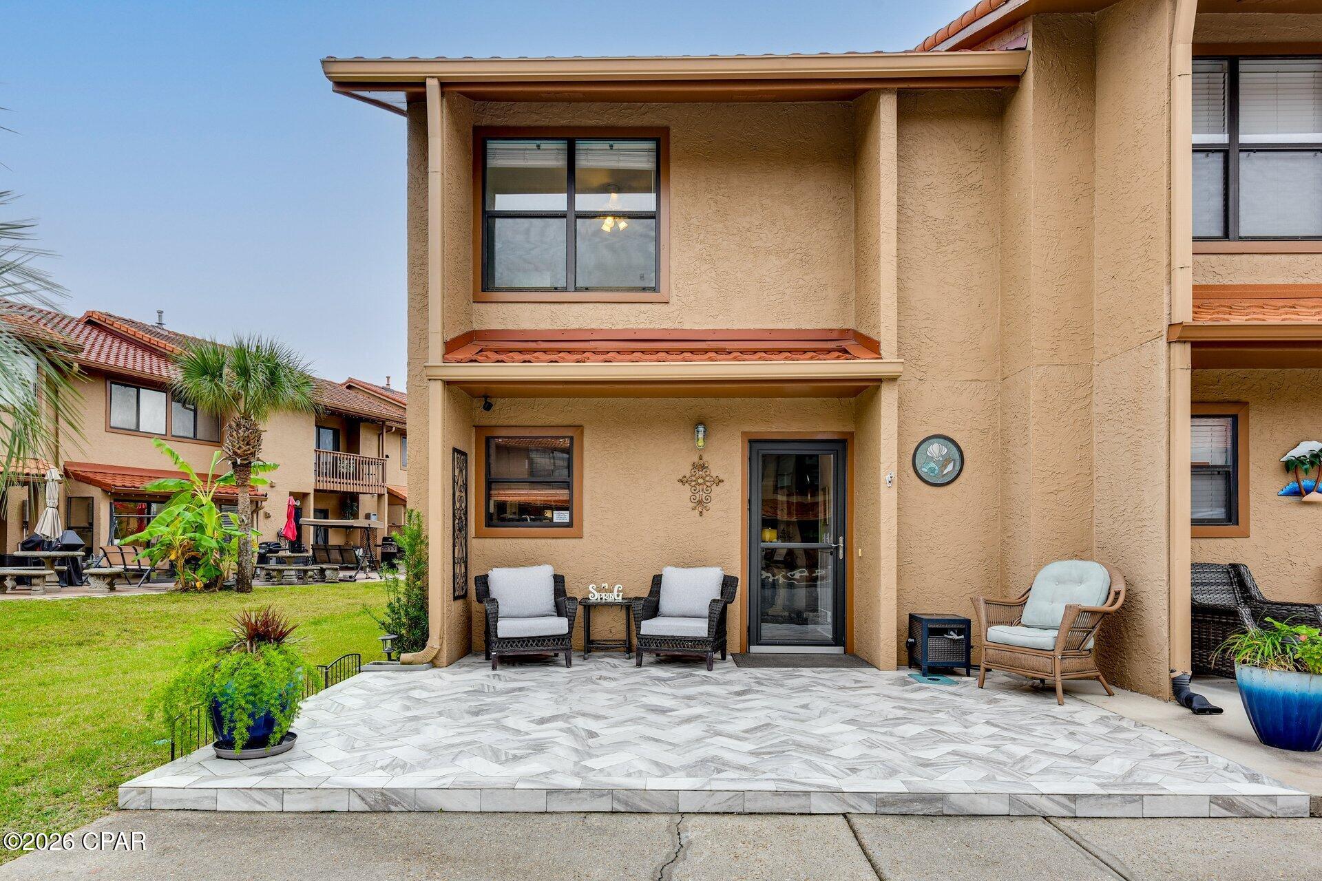 Beautiful, recently refurbished town home with high quality furnishings.  This town home is very popular because it backs up to the Grand Island pool.  It has 3 parking spaces and tile has been installed on the front and back patio.  The interior has a gas fireplace and has been upgraded with theater seats with matching sofa, new mattresses, a king size bed in the Master with a setting area.  Also a furnished Florida room down stairs.  The A/C is also new. This townhome has been tastefully decorated. For rental purposes this unit has a 4.9 rating from 75 reviews.  The kitchen is fully furnished.  The complex has 11 swimming pools, 5 heated, 2 acre mini golf course, 4 tennis courts, 2 lighted at night, and 3.2 miles of street area , great for walking your dog, or just riding your golf cart.  It also has a clubhouse and pool on the gulf across the street.