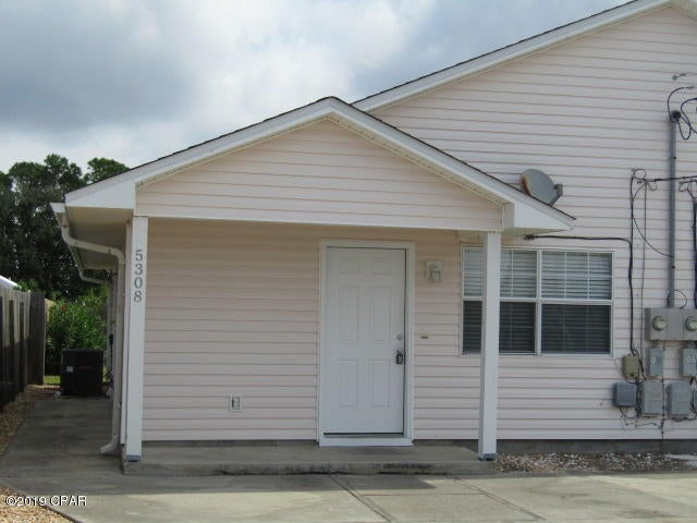 Walk to the beach from this 2 bedroom, 1 bath duplex. Unit features open/living area, laundry room, back deck and fenced back yard. Lawn service provided. Freshly painted.