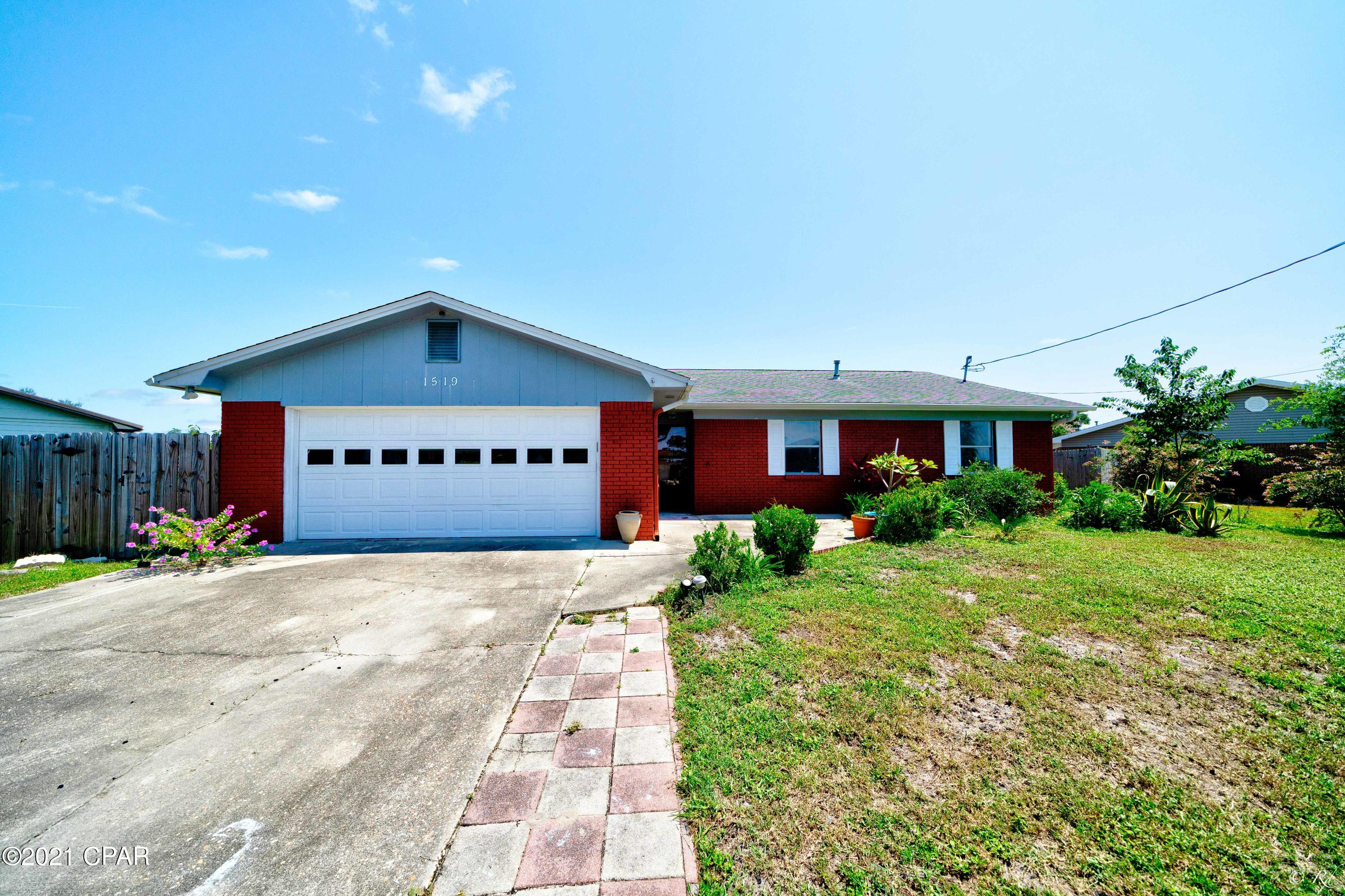 This beautiful 3 bed, 2 bath brick home is located in a quiet neighborhood in the desired Bay Front community. The large and open living area features hardwood floors, a brick fireplace, and vaulted ceilings. The eat-in kitchen boasts a Bay window, stainless steel appliances, granite countertops, plenty of beautiful cabinet space for storage and tile flooring with a formal dining area. The master bedroom is equipped with hardwood flooring throughout, a walk-in closet and its own private ensuite.  The master bathroom boasts a tile surround shower/tub combo, tile flooring, and an updated vanity. The two guest bedrooms share a bathroom equipped with a tile surround shower/tub combo and white tile flooring. The home features an open sunroom with plenty of natural light to enjoy day or night. This home has a large patio with a fenced in backyard perfect for enjoying the Florida sunshine with family. This home is located near restaurants, schools, and grocery stores for your convenience. Check it out today!
