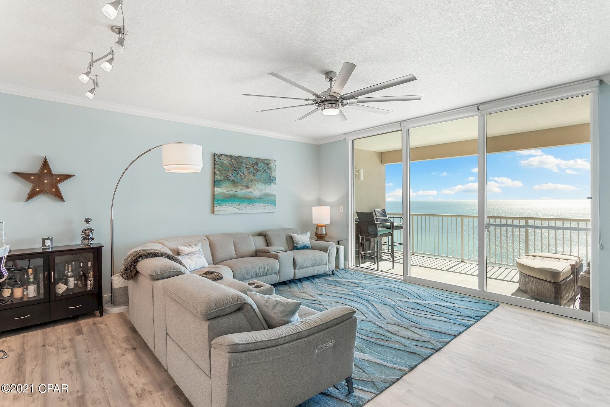 Incredible opportunity to own an upscale fully renovated Gulf front condo on the desirable west end of Panama City Beach! This unit boasts an expansive open floor plan totaling 1,026 sq ft offering 1 bedroom, 2 bathrooms & an additional bonus room with Murphy bed and office, ideal for remote working. The renovated kitchen is absolutely stunning with thick concrete countertops & breakfast bar, custom cabinetry with added coffee bar, new stainless steel appliances, beautiful tile backsplash and under mount lighting. There is custom lighting added by breakfast bar, LED's & modern fans. The living area features new luxury vinyl flooring and coastal decor that mirrors the emerald waters of the Gulf. The floor to ceiling sliding glass doors & windows truly enhance the Gulf views. New AC 2019! The unit is bright & welcoming with floor to ceiling glass sliders, raised ceilings, crown molding and an open floor plan. The open floor plan makes dining, entertaining, and relaxing easy. Enjoy stunning Gulf views from all the common areas. When you are not taking in the views there is a new 75" TV in the living area that conveys. Access a spacious 170 sq ft balcony from the living area, the perfect place to relax & dine or enjoy your morning coffee. With 4 floors of underground garage, this unit offers 13th floor elevation with amazing panoramic views of the Emerald Coast. The master bedroom features a king bed, crown molding, 55" TV and a beautifully updated en-suite bathroom. The master bath has been updated with a new granite vanity and contemporary backlit mirror, luxury vinyl flooring and features a shower/tub combo. The bonus room is custom with a unique Murphy twin bed, added storage and a built-in Murphy office. There is also an owner's closet for added storage and direct access to a second bath. The guest bathroom features a new vanity, lighting and walk-in shower. There is a stackable washer/dryer in the unit for convenience.

Unit 904 would make a terrific turnkey investment, full-time residence, or true second home. A great feature about Palazzo is it is lower density than most complexes with just 129 units with approximately half of them being non-rentals. You can enjoy the laidback feel & privacy, however, if you decide to rent, they have great rental income potential as well with a projection of $45K!

Palazzo amenities include elevated Gulf front pool, hot tub, complimentary beach service (Mar-Oct), fitness facility, and meeting room. At Palazzo you are on the desirable West End of Panama City Beach, 1 mile from Pier Park shopping center and less than 20 minutes from the Panama City Beach International Airport. Palazzo has 4 levels of covered Gulf Front parking under the building, so no need for massive parking garages with elevated walkways across the street. Do not miss out on this amazing opportunity to own an incredible unit at one of the finest condominiums in Panama City Beach!