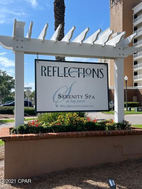UNDER CONTRACT....SELLER TAKING BACKUP OFFERS.  Breathtaking is first thought as you look over the treetops to see a spectacular view of Grand Lagoon, The Pass to the Gulf, Shell Island and Gulf of Mexico.  You will never want to leave the balcony.  Condo has granite counter tops, tile floors, large master bath, 10' ceilings, spacious kitchen and more.  Community features include 10,000 sf pool, tennis courts, restaurants, golf course and marina(presently being reconstructed.  A lifestyle to enjoy for years!.