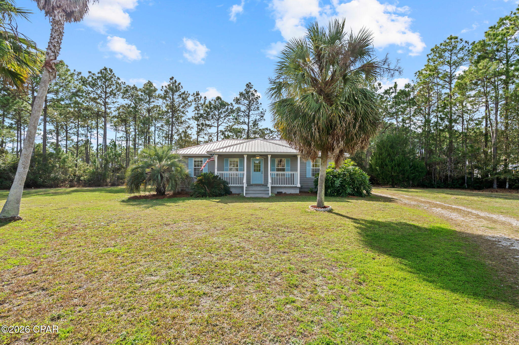 THIS BEAUTIFUL COASTAL COTTAGE ON AN LARGE, ALMOST 3/4 ACRE LOT. FEATURING 3 BEDROOMS AND 2 BATHS, ON A VERY QUIET  CUL-DE-SAC WITH A  DETACHED CARPORT W/ STORAGE SHED. IDEALLY LOCATED JUST MINUTES FROM ST. JOE  BAY. THIS INVITING HOME HAS BEEN THOUGHTFULLY UPDATED WITH NEW LIGHTING, MODERN FIXTURES, QUARTZ COUNTERTOPS IN THE KITCHEN, AND GRANITE COUNTERTOPS IN THE BATHROOMS THIS HOME IS  PERFECT FOR FULL TIME LIVING, A VACATION GETAWAY OR INVESTMENT PROPERTY, SHORT AND LONG TERM RENTALS ARE ALLOWED. NO HOA IN THIS COMMUNITY.  ENJOY AN EASY DRIVE TO THE SUGAR SAND BEACHES OF CAPE SAN BLAS OR  TO THE CHARM, DINING,AND SHOPPING OF DOWNTOWN PORT ST JOE.  A PUBLIC BOAT RAMP AND MARINA IS LOCATED CLOSE BY, MAKING IT EASY TO ENJOY ALL THAT COASTAL LIVING HAS TO OFFER. NEW METAL ROOF IN 2022, JUST SERVICED HVAC AND SEPTIC SYSTEM. THIS PROPERTY IS TURN KEY READY. SEPTIC TANK INSPECTED AND SERVICED 1/2026