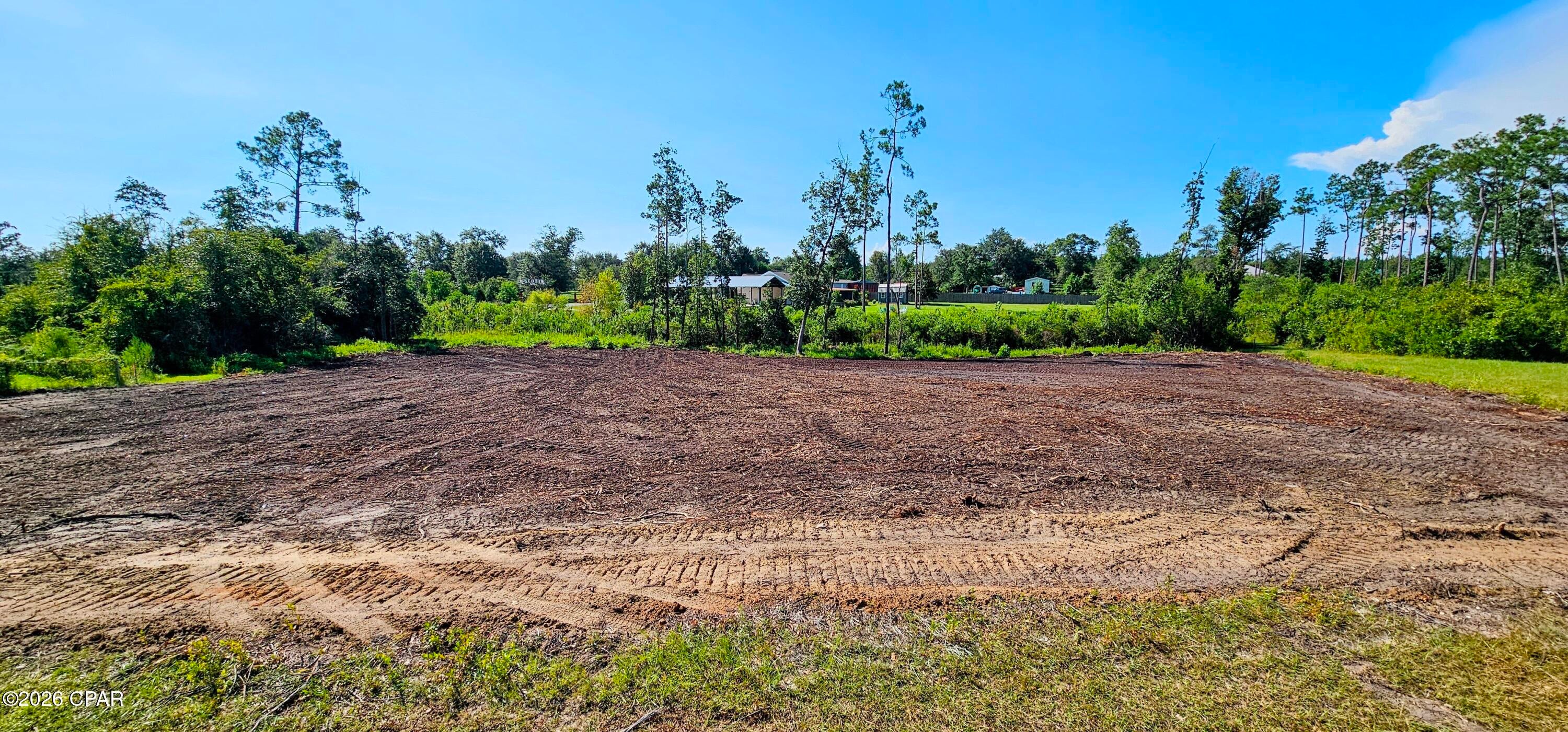 Discover an excellent opportunity to own approximately 0.80 acres in the Bear Creek area of Bay County, Florida. Parcel 03805-326-010 offers a peaceful setting with convenient access from a paved road, making this property an appealing option for those looking to build, invest, or secure additional land in a growing area.

The property has been recently cleared, providing a clean starting point for future plans and allowing buyers to more easily evaluate the land and its potential. Whether you are looking to construct a new home, establish a private retreat, or add acreage to your investment portfolio, this parcel offers flexibility and plenty of room to explore your possibilities.

Located in the Bear Creek community, the property provides a more rural atmosphere while remaining within reasonable driving distance of the amenities and services found throughout Bay County. Outdoor enthusiasts will appreciate the area's natural surroundings and proximity to the recreational opportunities that make Northwest Florida such a desirable place to live.

With approximately 0.80 acres, paved-road access, and recent clearing already completed, this parcel is ready for its next owner. Opportunities to purchase affordable land in Bay County are increasingly attractive for buyers seeking space, privacy, and long-term potential.