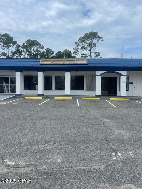 Absolutely great location on the popular Thomas Drive. New roof July 30, 2021.
3 units right across from the Navy base. Anything would be a money maker here.. Property has 3 freestanding buildings compromised  of 2 offices and a huge warehouse that is 2880 sq feet climate-controlled built in 2008 with 19' peak, 12' eaves and 14' roll up door, sprayed in insulation and foundation is plumbed for a restroom. This is rented for $2500.00 a month. 1312 Navy Blvd, Building A is 2760 sq feet with an open concept workspace with multiple entries and a restroom. Building B is approximately 1020 sq feet office space. Building B is rented for $2500.00 a month on a 3 year lease. There are also 4 other storage buildings on the property. There is a 2880 Sq foot climate controlled warehouse that is rented for 2500.00 a month. 1312 Navy Blvd will lease for 4500.00 a month.