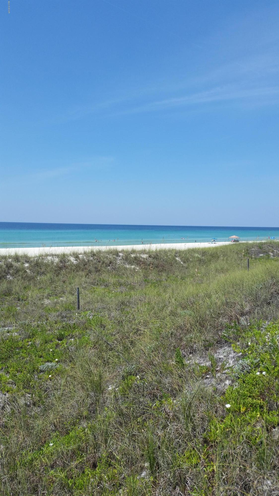 This is an incredible opportunity to build your get away home,  a Beach lot with access to 1200ft of beautiful dedicated gulf front property only a short walk or golf cart ride to the gulf.