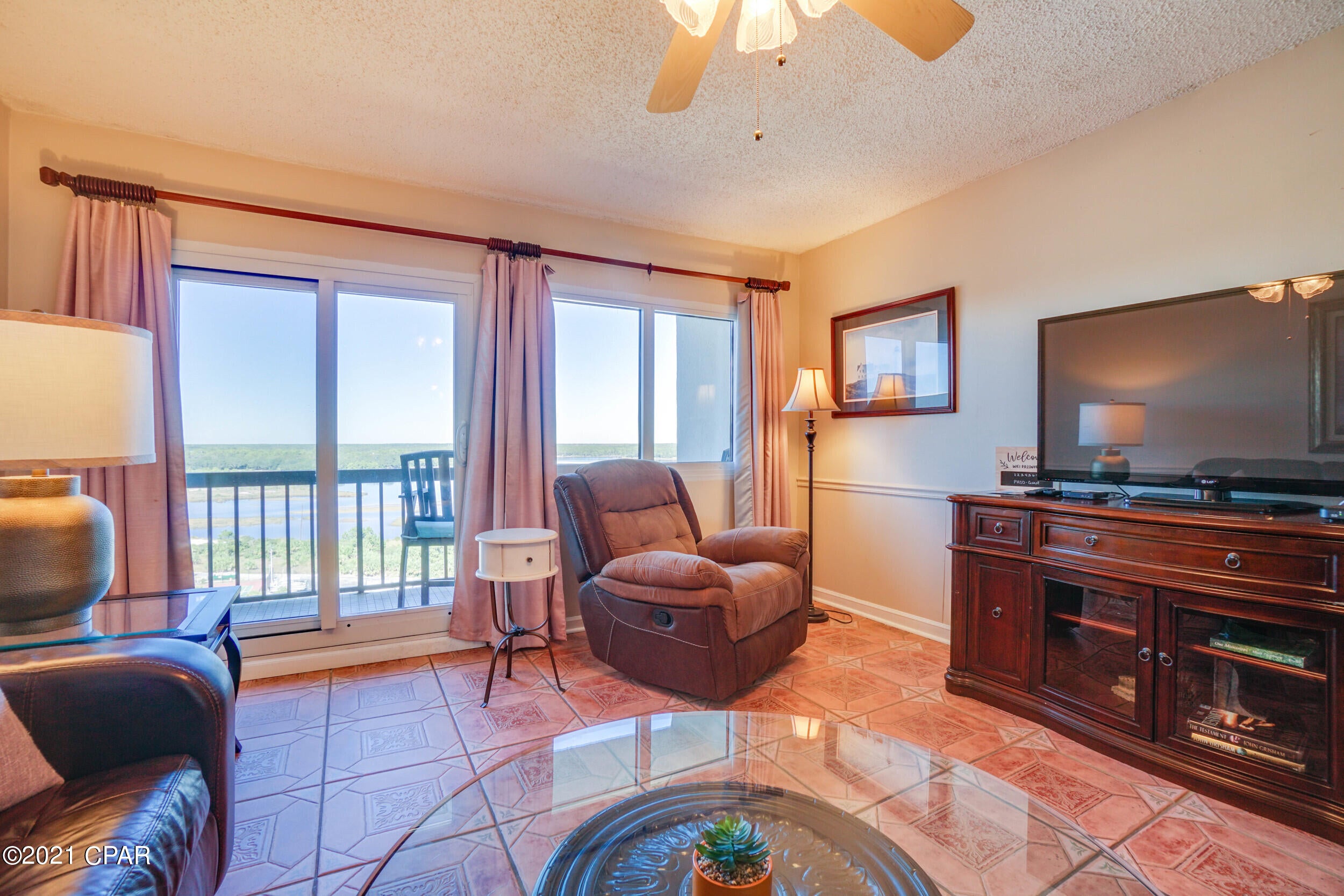 Beautiful Top Floor Penthouse, complete with large Balcony overlooking Lake Powell, & unobstructed Gulf views from kitchen & bedroom! Desire 2 Bedrooms?? Other identical units have converted current living area into Huge Master, complete with Balcony. This provides a 2/2! Two floors provide unique privacy with complete Bedroom suite on 1st floor. Perfect condo for Full Time or Rental. Amenity filled community, including Walk on Beach Access with Over 1/4 Mile of Beach Frontage, Large Gulf Front Indoor/Outdoor Heated Pool (two total), Sauna, Fitness, Library, Boat docks, Boat Trailer parking, Tennis, In Unit Washer/Dryer, & more. Pinnacle Port is nicely tucked inside gated Carillon Beach community, on the edge of 30A!  Buyer/Buyer's agent to confirm all information deemed important.