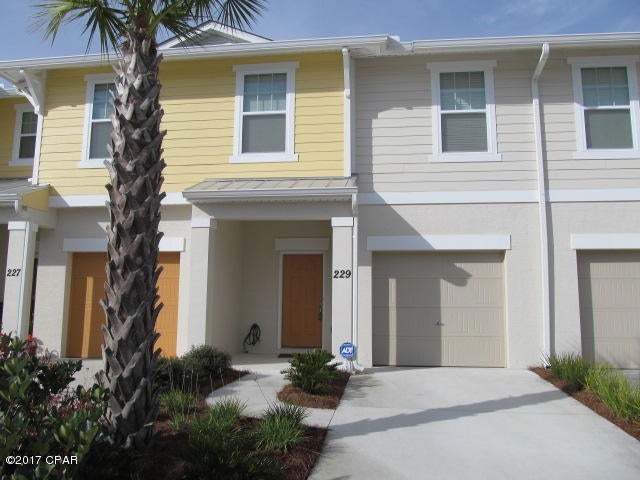Whisper Dunes - Located at the west end of Panama City Beach, this 3 bedroom, 2.5 bath townhome features open living area and 1 car garage. All bedrooms are located upstairs. Washer and Dryer are ''AS IS''. Community features in ground pool. Lawn service and garbage are included in rental rate. 1 small dog under 10lbs allowed.