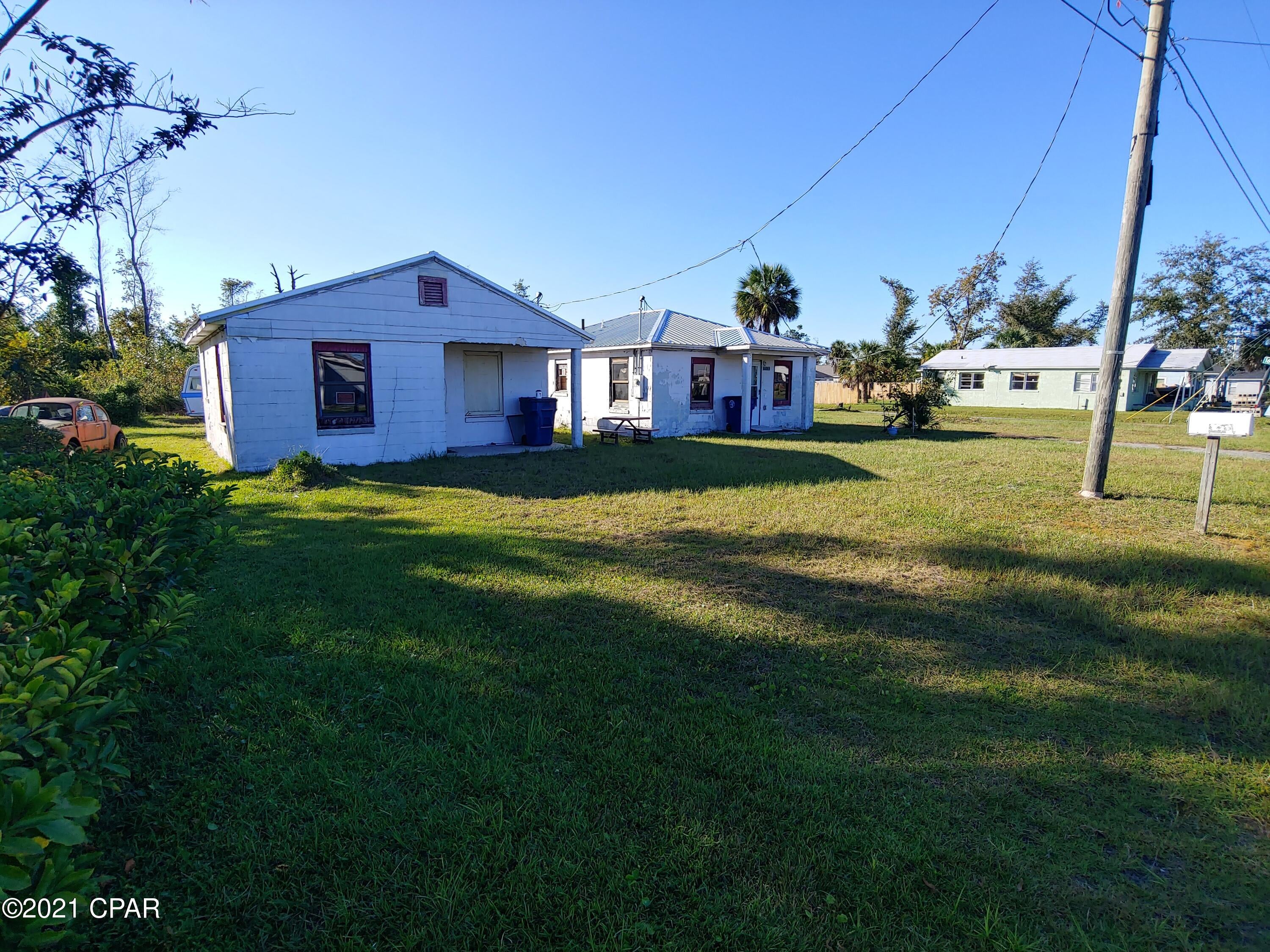 Investment opportunity centrally located in Panama City! 2 Cement block Homes on large corner lot. 1 Bed 1 Bath and 2 Bed 1 Bath would make great rentals! Both have newer metal roofs and need complete interior renovations. Some plumbing and electrical work has been started.



1 Unit has new electrical panel and meter with power on site. Get this project started today. Call/Text/E-mail for more info or to schedule a showing today!



Features, dimensions, uses are all approximate, to be verified by buyer if important.