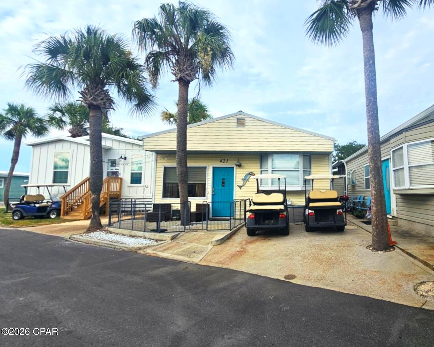 Introducng 421 Snook Lane, located in the very desirable community of Venture Out.   This 3 bedroom 2 bath home is the PERFECT vacation home, live in it when you desire and rent it out to vactationers the rest of the time to help pay for itself.   It is the ideal investment. The interior of the home has been renovated and comes furnished making it an easy move.   The kitchen has styish wood cabinets with a full black appliance package and a breakfast bar that opens up to a dining room.  Tiled floors are throughout the home except for vinyl in the living room.  All three bedrooms are very well appointed and quite large  and with 2 bathrooms there is plenty of room for everyone.    The exterior of the home is easy to maintain vinyl siding with a metal roof.   The benefits of Venture out are numerous with a dedicated beach and clubhouse on the Gulf, boat launch, pickle ball and tennis, mini golf and a golf cart friendly neighborhood. To add to that, TWO golf carts are included with the sale.   Come see what Venture Out has to offer and check out this gorgeous home at 421 Snook​​‌​​​​‌​‌​​​​‌​​‌​​​​‌‌ Lane.