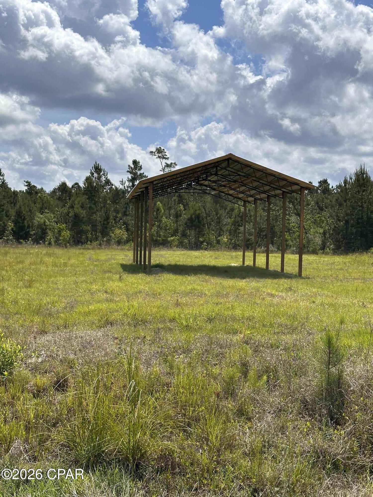 Discover this beautiful  lot on the scenic Jarrett Daniels Highway. Property has a new 24x48 Pole Barn. Electricity is running to the property. With 65 loads of dirt already in place, bladed, and build ready, the groundwork is done and waiting for your vision. Just minutes from Mexico Beach, local creeks and the Intracoastal Waterway, this location offers the perfect balance of country living and coastal convenience. Whether you're dreaming of a camp getaway or building your forever home, this property is a fantastic opportunity. Great location, there's not a lot of property that comes available in this area. Don't miss it. Call today!