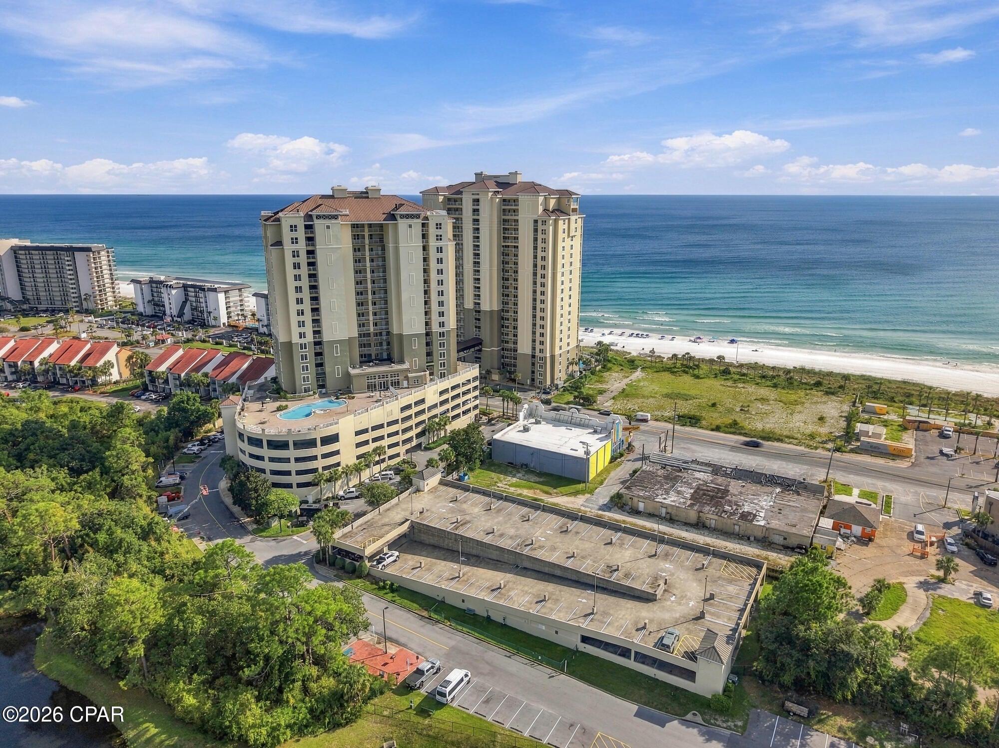 Welcome to your slice of paradise at Grand Panama Resort, Unit 2-305! This beautifully fully upgraded residence offers the perfect blend of coastal luxury, convenience, and proven investment potential.
Step inside to discover a coastal haven featuring upgraded furnishings, premium bedding, and modern stainless-steel appliances. Every detail has been curated for maximum comfort and style, making it entirely turn-key and ready for immediate enjoyment or rental guests. The open-concept living area flows effortlessly to your private balcony, where you can unwind and take in the beautiful resort and water views.
One of the most unique features of this unit's location is its proximity to the community's massive, same-floor observation deck. Just steps from your front door, this expansive outdoor space delivers breathtaking, unobstructed westerly views. It is the absolute perfect place to toast to the  Emerald Coast sunsets and mingle with friendly neighbors.
Situated in Tower 2, this condo sits safely above the five-story parking garage. This means you enjoy elevated views while benefiting from incredibly easy parking access. 
Backed by a strong and consistent rental history, Grand Panama 2-305 is not just a dream vacation home, but a potential income generator. Grand Panama Resort itself offers world-class amenities, including beachfront pools, fitness centers, on-site dining, and a private boardwalk to the sugar-white sands. Don't miss this rare opportunity to own a premium, upgraded unit in one of Panama City Beach's most sought-after resorts!
