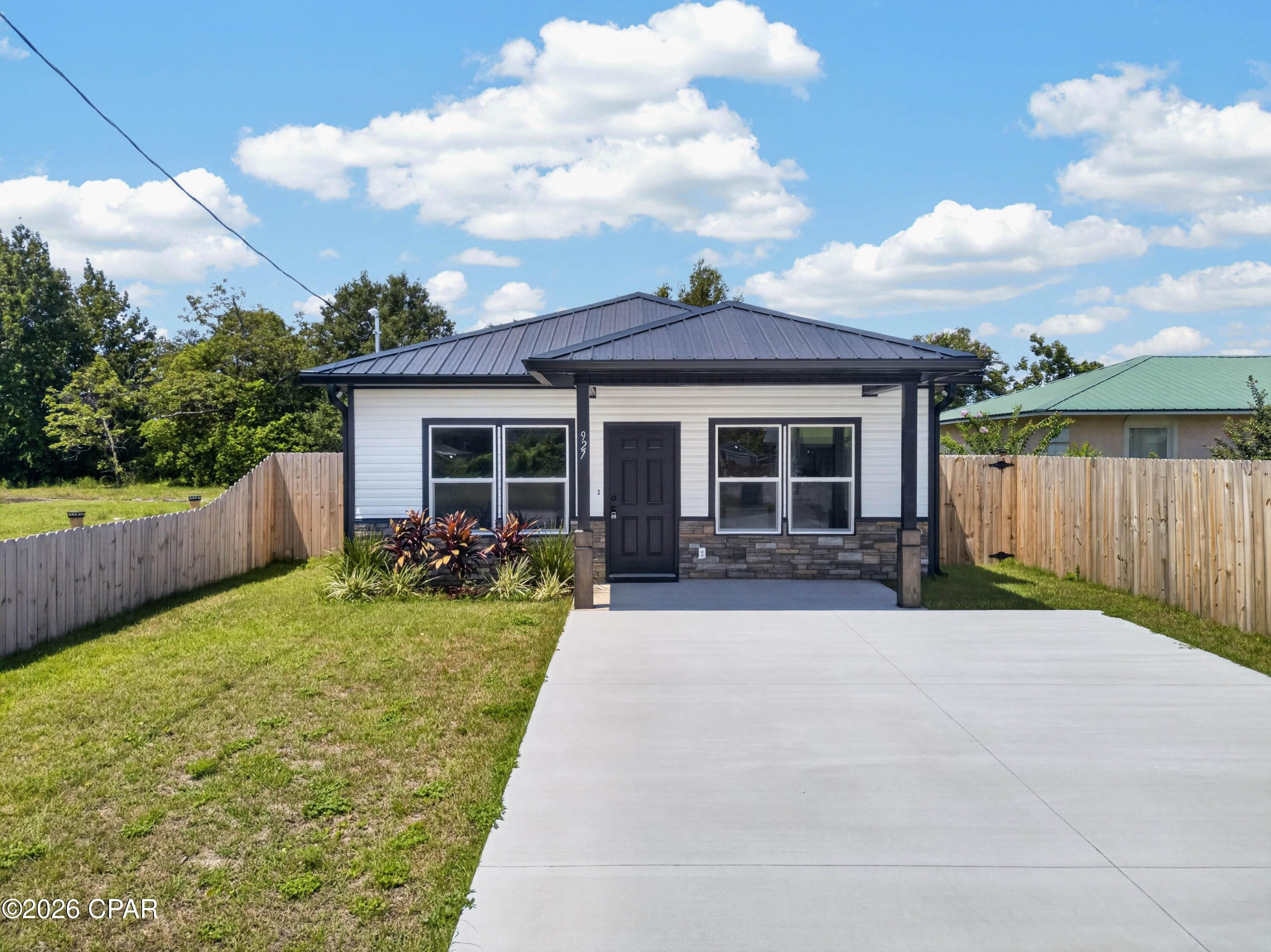 MOTIVATED SELLER! BRAND-NEW 2026 HOME NEAR TYNDALL AFB!

Don't miss this opportunity to own a beautiful brand-new 2026 home at 927 Spring Ave in Panama City! Move-in ready and designed with modern comfort in mind, this home features a bright, open layout, stylish finishes, spacious bedrooms, and a beautifully designed kitchen with Samsung appliances.

The living room makes a statement with a fireplace and custom feature wall designed for shelving and a TV the perfect space to relax or entertain.

Step outside to a freshly landscaped yard with plenty of room to enjoy the Florida lifestyle. Conveniently located near Tyndall AFB, downtown Panama City, shopping, dining, parks, and Gulf Coast beaches.

New construction, great location, and motivated seller come see it before it's gone! Schedule your private showing today!