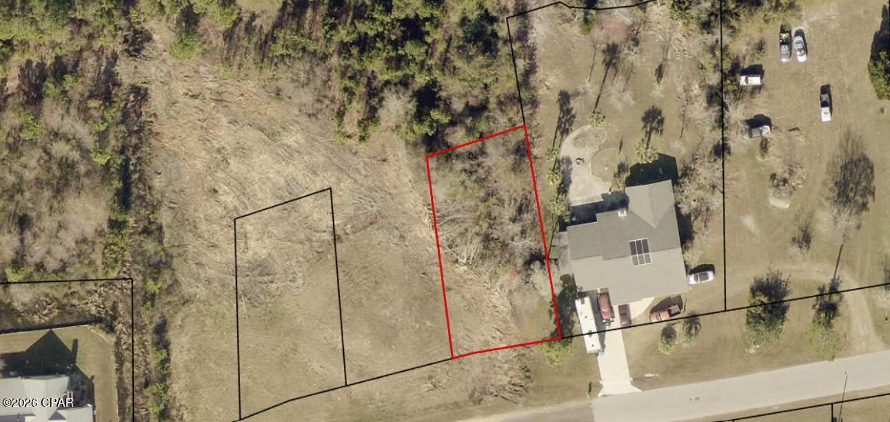 Build your new home on this approximately 0.186-acre vacant lot located on Country Club Drive in the Sandy Creek Country Club community. This property offers a great opportunity to design a home that fits your needs while remaining conveniently located near Tyndall Air Force Base, shopping, dining, and everyday necessities. Purchase now and begin planning your future home or add the property to your investment portfolio. Buyer to verify all measurements, utilities, building requirements, and restrictions.