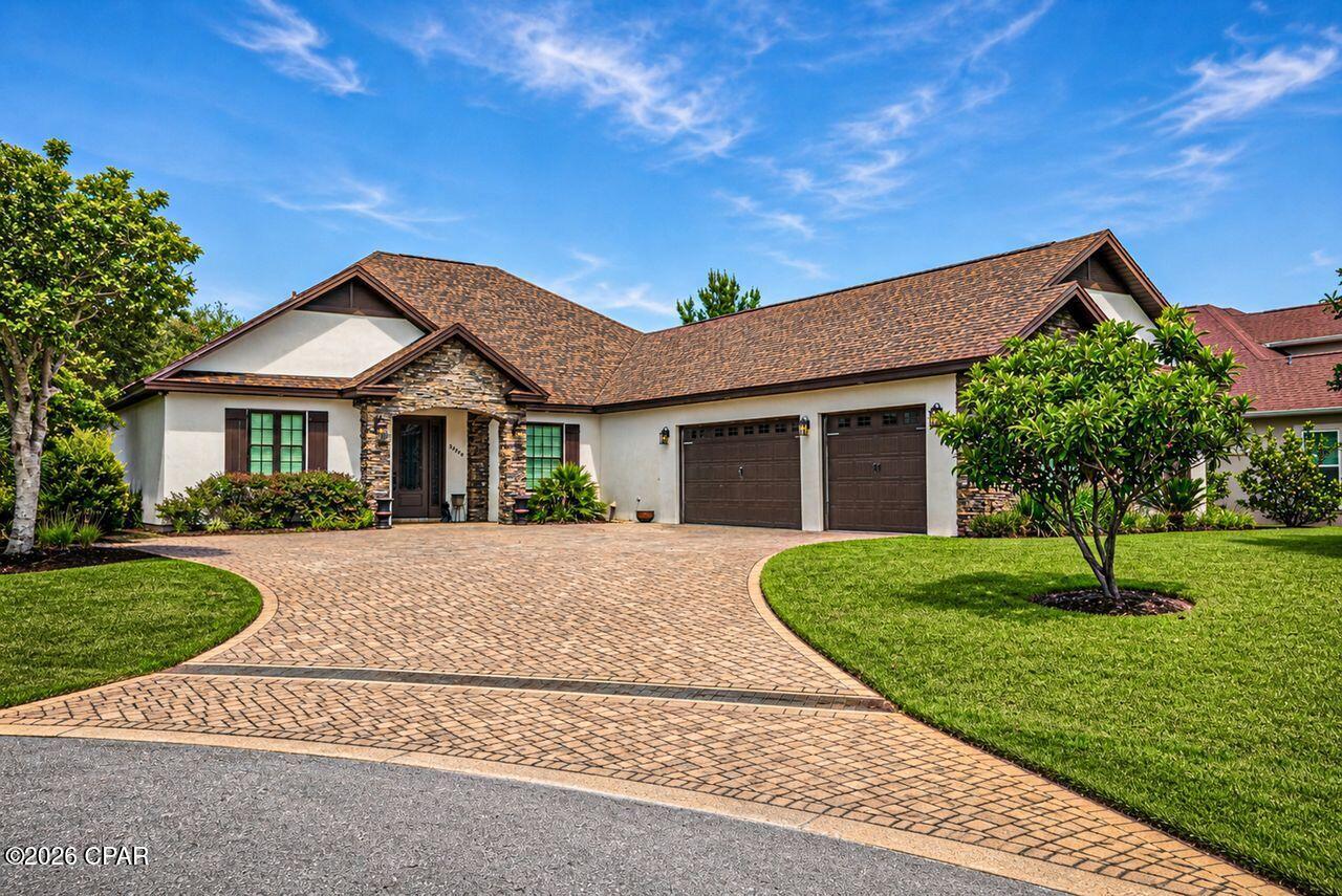 Nature Lover's Dream in the Exclusive Gated Preserve on the Bay.  Welcome to 3206 Deer Haven Blvd where comfort, privacy and Florida lifestyle connect beautifully.  This stunning one level home was built by a highly reputable builder and as his personal home.  Craftsmanship, bells and whistles throughout this 4 bedroom, 3.5 bathrooms, large office, and oversize garage, with 3077 sq feet of heating and cooling living space.  Stepping into the large foyer, you are greeted by a bright open concept that feels welcoming, functional, and abundance of natural lighting throughout.  The heart of the home is the expansive kitchen with a large island/breakfast bar and quartz countertops. A great open floor plan overlooking the large family room.  The main living area has a fireplace and built in surround system, and built in wall units.  The connected custom den (18.5 x 10.5) gives you additional square footage with comfort to sip your early morning cup of coffee, while viewing the beautiful back yard.   The dining room is well accented with natural lighting and great for those large family gatherings.  This home has high end finishes throughout, to include two-tiered crown molding, detailed custom trim, and 10-foot ceilings in every room. Split floor plan provides privacy with the entire left wing dedicated to the master suite. Large spacious master bedroom with walk in closets, dual vanities, large glass-enclosed frameless shower, and relaxing claw foot tub. The right wing incorporates the other 3 bedrooms with one having a full bathroom shower. This section of the home also contains a large office and laundry room.  The large oversize garage can accommodate 3 cars and room for a golf cart.  Stepping into the back yard, you will fall in love with the natural oasis of a large lush yard, preserved natural area, thus perfect for entertaining. Relax in the covered patio and at times watch the deer, rabbits and variety of bird species, thus giving you a feeling of being in a Sanctuary.  Front yard incorporates a pristine landscaping with the driveway completely custom paved. Sprinkler system throughout on a well and roof installed in 2019.  This custom-built home with abundance of craftsmanship, delivers generous interiors, abundance of natural lighting, and seamless indoor/outdoor flow. Enjoy your dream home minutes from our white sandy beaches, restaurants, shopping and marinas. If you are a golf fanatic, the Jack Nicklaus Course at Bay Point across the road in Bay Point, will accommodate your golfing needs. Let's make an offer on this fabulous home selling under appraised value (Certified Appraisal on hand for Approved buyers.) All measurements are estimates and should be verified by Buyer/Realtor.