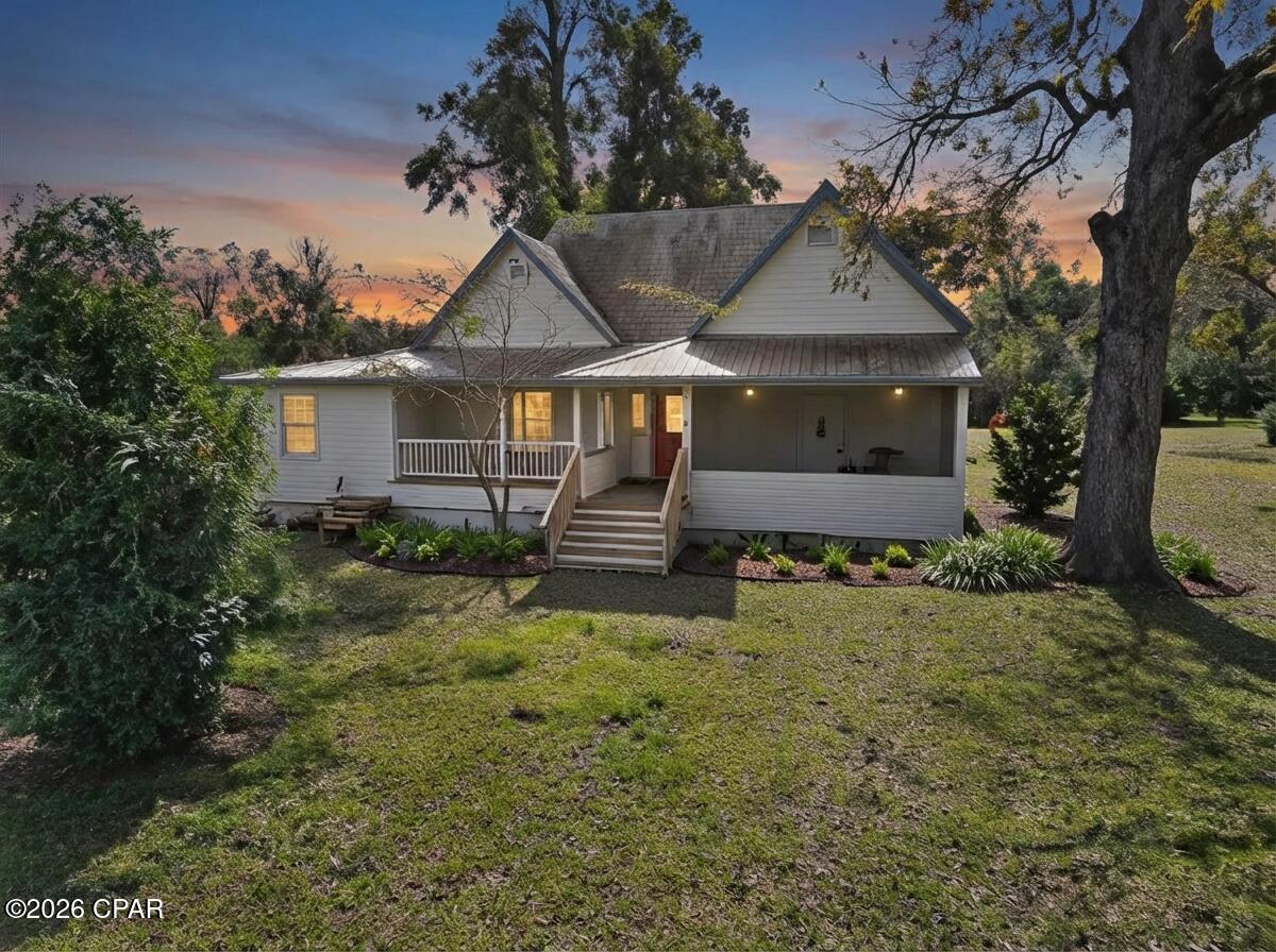 If you're looking for authentic farmhouse charm - this is it!
Nestled on a beautiful 1± acre lot in the heart of Greenwood, this timeless treasure offers the perfect blend of history, character, and potential. Step inside to find original hardwood floors, 10-foot ceilings, and all the vintage details that make classic farmhouses so special.

With just a few thoughtful updates, this home could easily become a showstopping retreat -- a place where character meets modern comfort. From the spacious rooms to the peaceful outdoor setting, every inch of this property invites you to slow down and enjoy the beauty of country living, right in town.