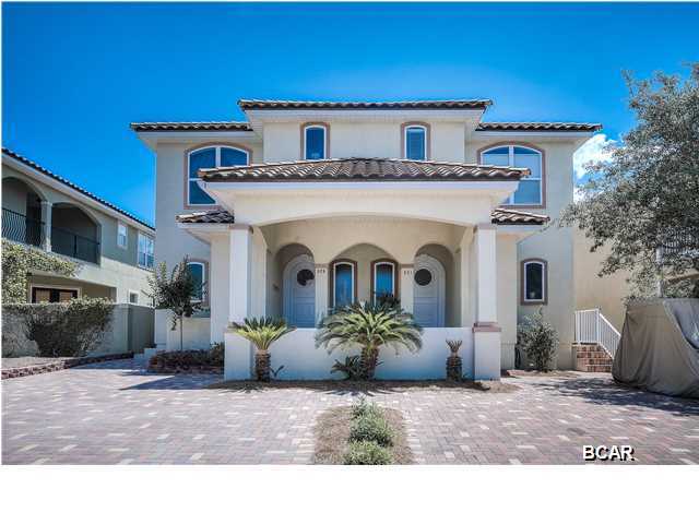 JUST REDUCED*Offered fully furnished*Great floor plan and spacious home makes this ideal for primary residence, investment, or rental.Beautiful cabinetry, SS appliances, and solid surface counter tops.Stunning Master suite has large bathroom with separate shower and tub with lots of tile, and a private covered porch.Open design on first floor with high ceilings, fans, and a tropical ambiance to enjoy. Exterior is freshly painted and all stucco maintenance done last year*New 14 seer Air conditioning system and new furnace;recent stucco maintenance and exterior elastomeric paint. All of this in an exclusive Gated community on the quiet, west end of Panama City Beach. Golf cart friendly, rentals allowed, two pools (one of them on the beach!), tennis court, clubhouse, a hot tub. All information contained herein is intended to be correct; however, Buyer assumes responsibility for verification of all information. interior painting underway! *any booked rentals may convey with sale or be relocated depending on days to close and contract.
