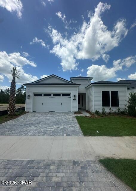 Palmetto floor plan. Coastal front elevation. Under contract 1/22/2026.