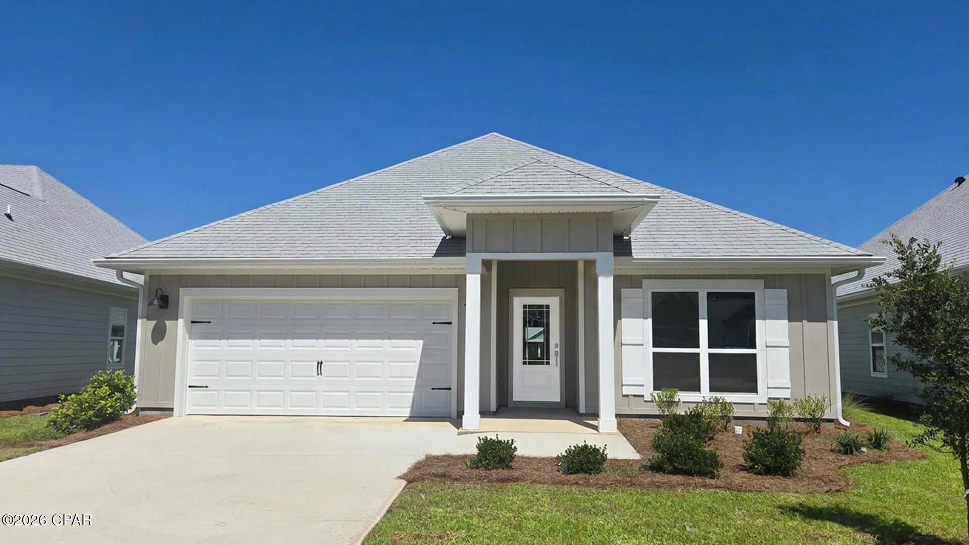 Welcome to 562 Hancock Way at Bayside at Ward Creek in Panama City Beach, Florida. This home is under construction and features the Rhett floorplan. Enter through a bright entryway to find EVP flooring in the foyer leading to three guest bedrooms. Continuing through the foyer you will find an open and spacious living area. The kitchen serves as the heart of the home and features quartz countertops, beautiful white upper and lower cabinetry and a stainless-steel appliance package that includes a smooth top stove, microwave, and dishwasher. Enjoy spending time with guest and family comfortably with your open kitchen. 

The primary bedroom is located off the living area and has private ensuite bathroom with a large shower with glass enclosure, dual sink vanity with quartz countertops and lower cabinetry for storage, a separate water closet and large soak tub as well as a large closet. The guest bedrooms have spacious closets and share a full bathroom with shower and tub combination. Each bedroom has plush carpet and spacious closets. This home has a Home is Connected® Smart Home Technology Package.  

Enjoy afternoons or morning coffee from your covered back patio or relax on your front porch as you look out to your lawn and a flower bed off the entry walk.