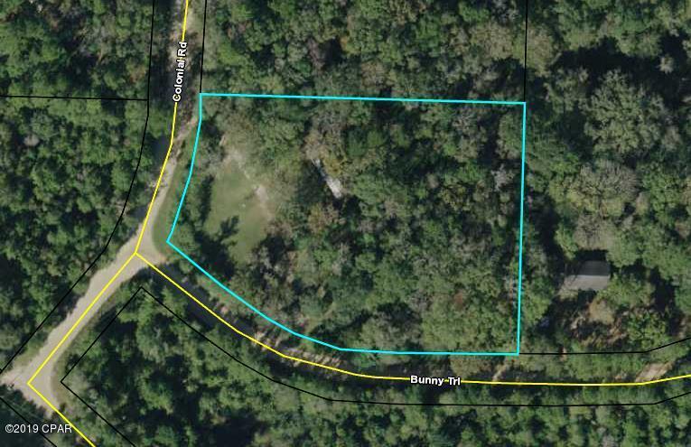 Corner location just outside the city limits of Marianna.  1 well,  1 power pole and 2 septic tanks.  Damaged MH of no value on property.