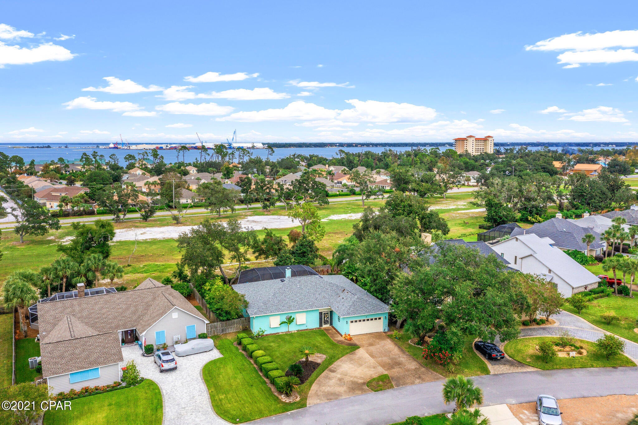 One of the better neighborhoods to invest in right now. The St Joe Company that is known for bringing big values to neighborhoods like WaterColor, WaterSound, Lattitudes and just too many to list; is rebuilding the Bay Point Marina that will reopen early 2022. This will be one of the best full service marinas on the Emerald Coast of Florida. So hurry up and buy low and watch your property values sky rocket. Come see this Florida Style Home before it is SOLD! Lots of bright natural light and space .Nestled in the wonderful neighborhood of Bay Point. Living in Bay Point is so much fun! Lots of neighborhood events and amenities including the Famous Jack Nicklaus Golf Course, restaurants, summer concert series in the park, monthly farmers market. This home offers natural gas HEATED POOL & SPA, two casual dining areas. New kitchen with huge island with soft-close custom cabinets on both sides, quarts counter-top featuring the waterfall end, upgrades over $40k. All new SS ''slate'' appliances, fun etched doors for the pantry & laundry. French doors lead into the master suite with large double vanity & dressing area huge walk-in closet, garden tub & separate shower. New screened lani, resurfaced in-ground pool. Beautiful master en-suite with poolside views.Two bright guest rooms share a large bath. Full 2 car garage. New doors & windows, new roof, new pool Lani, pool recently refinished, Bahama-hurricane shutters installed by Brannan Aluminum, freshly painted inside & out; popcorn ceiling removed and resurfaced ceiling a value of $14k, extra insulation was added 2019, average electric bill only $170 a month.Gas Rinnai Tankless Hot-Water heater with endless hot water. Fresh landscaping with mature fruit trees throughout the  and back yard. Irrigation on separate well.
