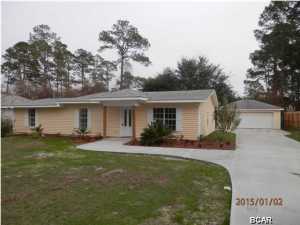 This home is 3 bed 2 bath approx. 1700sq' with a detached 2 car garage. Totally renovated and restructured home. The floor plan has been re engineered with an effective age of 2014, New roof, exterior siding and paint, landscaped, new driveway and walk. Interior offers a large open Great room and Kitchen area, freshly painted interior, all new flooring throughout with laminate wood in the Living room and Kitchen area, tile baths and laundry with new carpet in the bedrooms. Kitchen has new cabinets and granite counter tops as well stainless appliances. All new fixtures throughout as well as new vanities and tub in the bathrooms. You are close to the beaches as well as Pier Park. Seller will contribute up to $3000 towards buyers closing cost with acceptable offer.