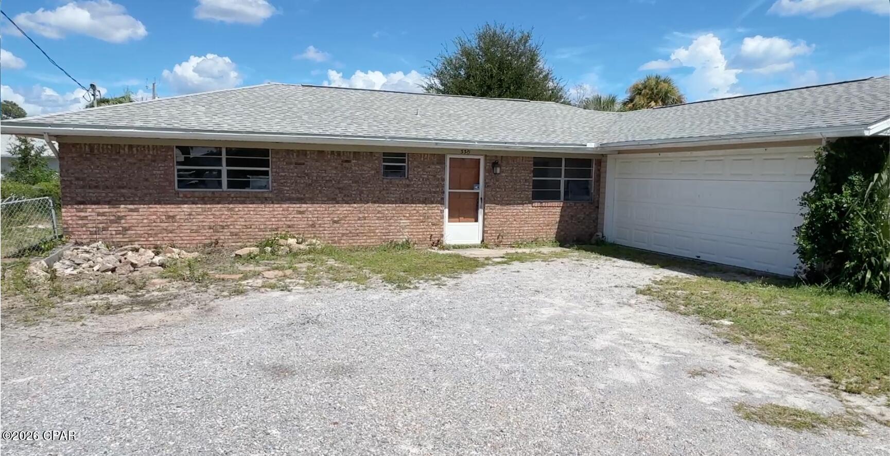 PICTURES COMING SOON.   3bd/2bth almost 1,600 sqft WITH A 2 CAR GARAGE - ONE STORY BRICK HOME.  Newer roof, 2018.  Newer septic system made with room to add another full bath if desired.  East end of Thomas Dr. area.  CLOSE TO BEACHES, COULD BE A GOOD SHORT TERM RENTAL.  Back yard is fenced and very large.  OVERSIZED LOT - 75x100.  We have a window bid in place to replace all the windows for $13,200.