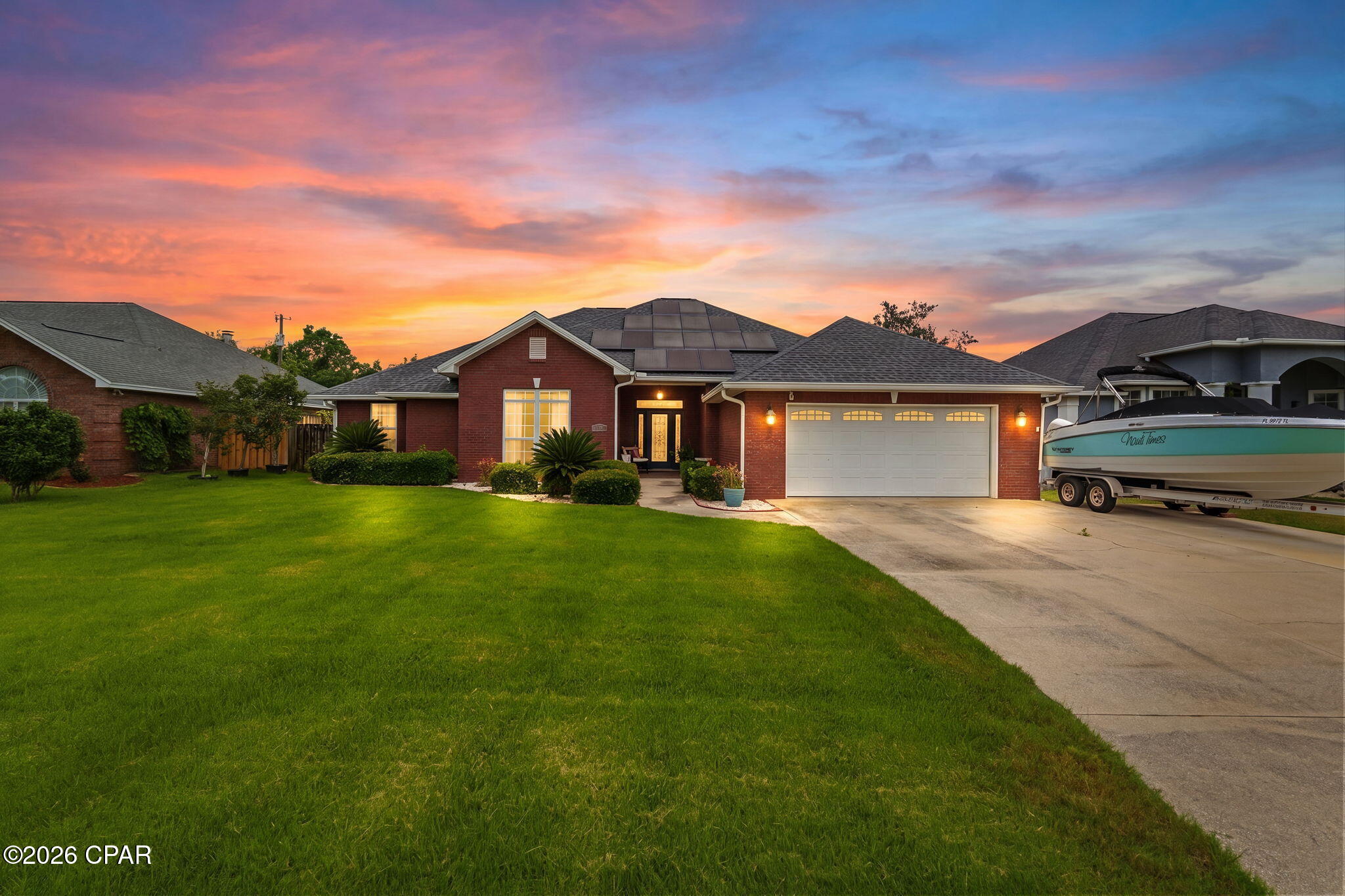 Pool days, backyard barbecues, football Saturdays, and unforgettable family gatherings--this Kings Point home was built for making memories.

Located near SweetBay, this beautifully maintained 4-bedroom, 2.5-bath all-brick home combines spacious living, thoughtful design, and exceptional outdoor entertaining.

Inside, you'll find an open-concept floor plan featuring soaring ceilings, a fireplace, and custom built-ins. The spacious kitchen is designed for gathering, offering granite countertops, rich wood cabinetry, stainless steel appliances, and a breakfast bar overlooking the main living area.

The split-bedroom layout provides privacy for the primary suite, complete with tray ceilings, dual vanity, a walk-in shower, and ample storage. Three additional bedrooms offer flexibility for family, guests, hobbies, or a home office.

Step outside and discover what truly sets this property apart. The fenced backyard is designed for year-round enjoyment with an in-ground fiberglass pool, covered patio, fire pit, and an incredible outdoor entertaining pavilion featuring a Blackstone griddle, Recteq grill, smoker, kegerator, television, and plenty of seating for friends and family.

Additional features include new roof, all-brick construction, a two-car garage, boat parking, mature landscaping, and solar panels that will be paid off by the seller at closing.

Kings Point is a well-established, family-oriented neighborhood offering convenient access to SweetBay,  shopping, dining, schools, Tyndall Air Force Base, downtown Panama City, and the area's beautiful beaches.

If you've been searching for a home that blends comfort, functionality, and resort-style outdoor living, 2907 Tupelo Drive is ready to impress.