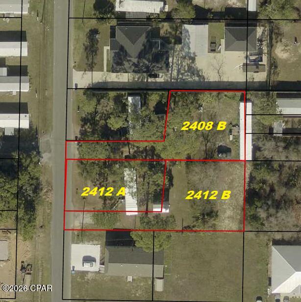 This investment collection consists of 3 lots (Parcel ID's 27779-020-010, 27779-015-010, and  27779-015-000.  Two lots have mobile homes that are oocupied, but have no value.  The property is zoned R-2(BC) which permits two townhomes to be built on each property or a duplex on each.  Buyer can purchase one property or all three at one time. Each property has it's own septic and sewer is available nearby.  A power pole is also on each property.  The white mobile home and the storage unit on 2412 Dorothy A&B does not convey.  

Possible financing available with a builder to build your investment/income property.