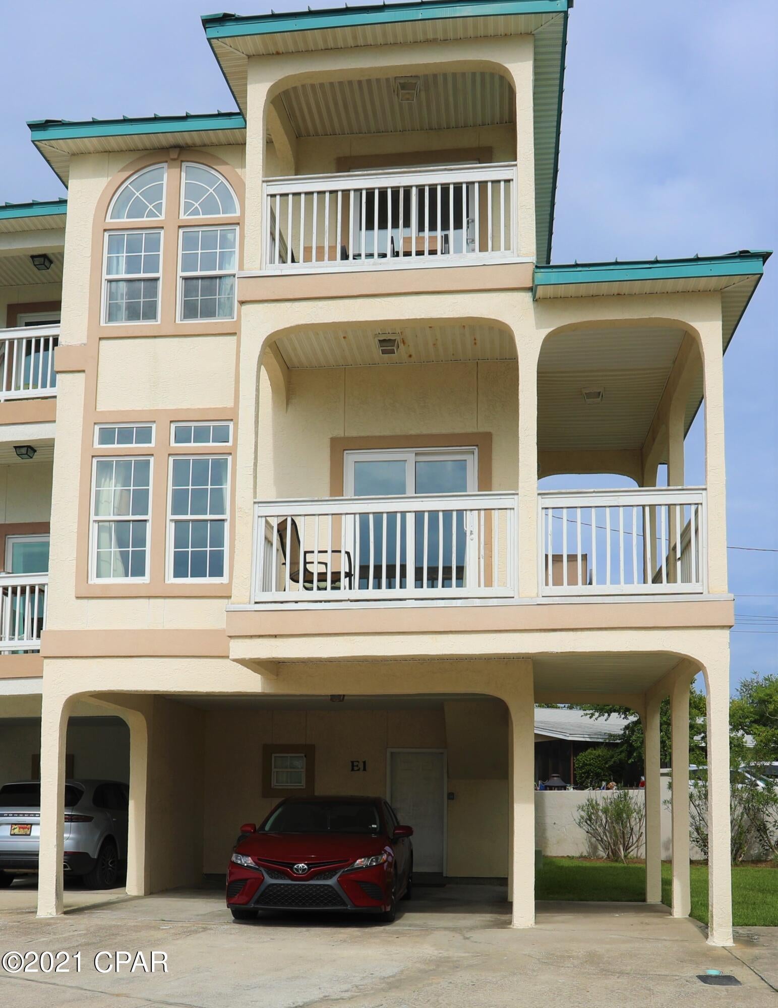 Under contract, seller accepting back up offers. Welcome to The Palms! This unit is conveniently located across Front Beach and is a short stroll to the pool and beautiful beach! This 3br/3ba comes fully furnished and is currently on a rental program. The unit comes with a separate lock out that sleeps 4 with use of the sleeper sofa. The lock out even has a  kitchenette and living room with a patio out back to relax. The second story features a spacious living area with balcony access to enjoy the view. Full size washer and dryer. Stainless steel appliances in the kitchen. The 2nd level bedroom features a queen and bunk beds. The master bedroom sleeps 5 and has Gulf views to enjoy from the wrap around balcony. Sleeps 13! 

2 parking spaces with one covered. Schedule your showing today