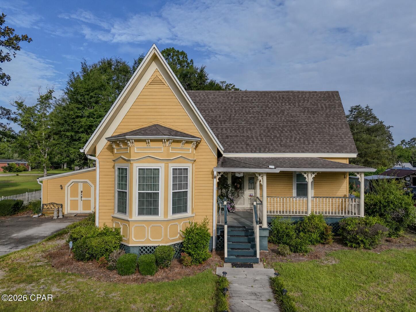 CURRENTLY UNDER CONTRACT, SELLER WILL CONSIDER BACKUP OFFERS
Nestled beneath the live oak canopy of Chipley's coveted South Third Street Historic District, this 1915 Queen Anne Victorian cottage is a rare find. While it is wrapped in timeless, vernacular architectural character, the home underwent a complete, top-to-bottom renovation in 1999 and has been meticulously maintained ever since. Enjoy structural confidence with a new 2019 roof (post-Hurricane Michael), updated plumbing, and high-efficiency blown-in attic insulation.

Step inside a floor plan designed for connection; you just know this is where families have gathered! The well-laid-out kitchen flows seamlessly into living spaces anchored by four stunning fireplaces. The layout features two spacious bedrooms, two full baths, a dedicated private office, and an oversized laundry room with abundant storage.

Outside, the property boasts the deep roots of a former ''Yard of the Month'' winner, offering incredible landscaping bones, mature greenery, and functional storage sheds.

As the estate is being cleared, this historic gem is being prepared for its next chapter--contact your Realtor today to schedule your private tour!