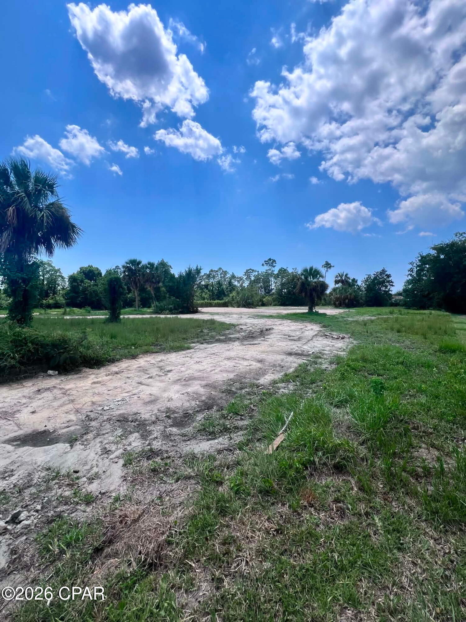 CALLING ALL BUILDERS and INVESTORS! Don't miss out on this HUGE LOT on over an acre, close to Tyndall Air Force Base and right around the corner from the Callaway Bayou, where boating and fishing are the best past time! Plantation Drive is a well known street in the community and has a mix of stately homes and new construction. With the lot size of 200'x300', a compound could be built, or with a lot split, two houses could be built! Build your forever home and an income producing property! There are endless possibilities!