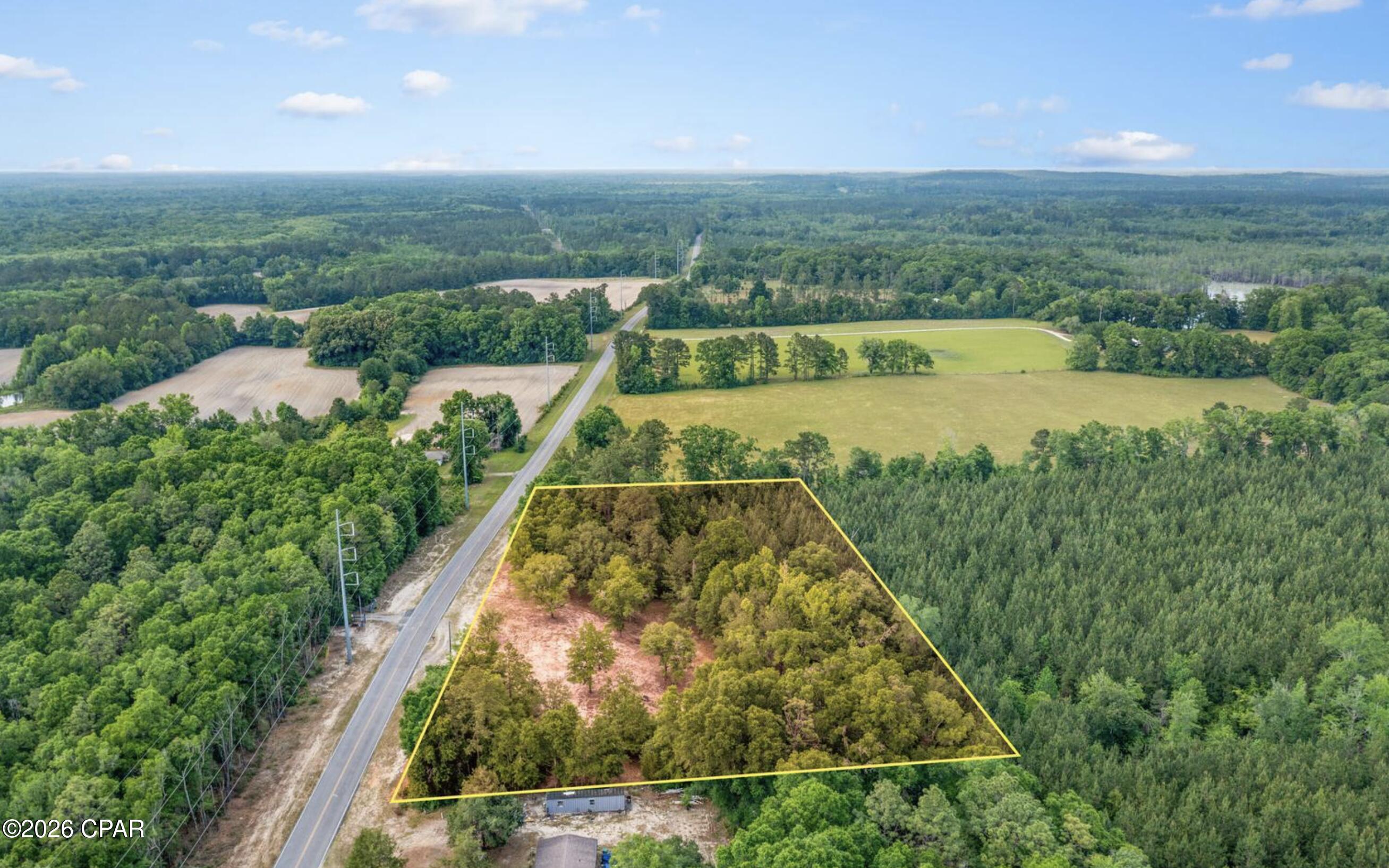 Nearly 3 acres of vacant land, boasting over 500 feet of PAVED road frontage. This property is located just 30 minutes north of the ''World's Most Beautiful Beaches.'' The 2.83 acres is partially cleared, just waiting on you to make it your own, offering a serene escape from the hustle & bustle, with ample space for building your dream home or weekend retreat. Surrounded by natural beauty, oak trees, & plenty of room to explore & enjoy nature, this parcel is an opportunity not to be missed. Seller has a current survey from 2023 that will convey with purchase! Don't miss out on this great property!