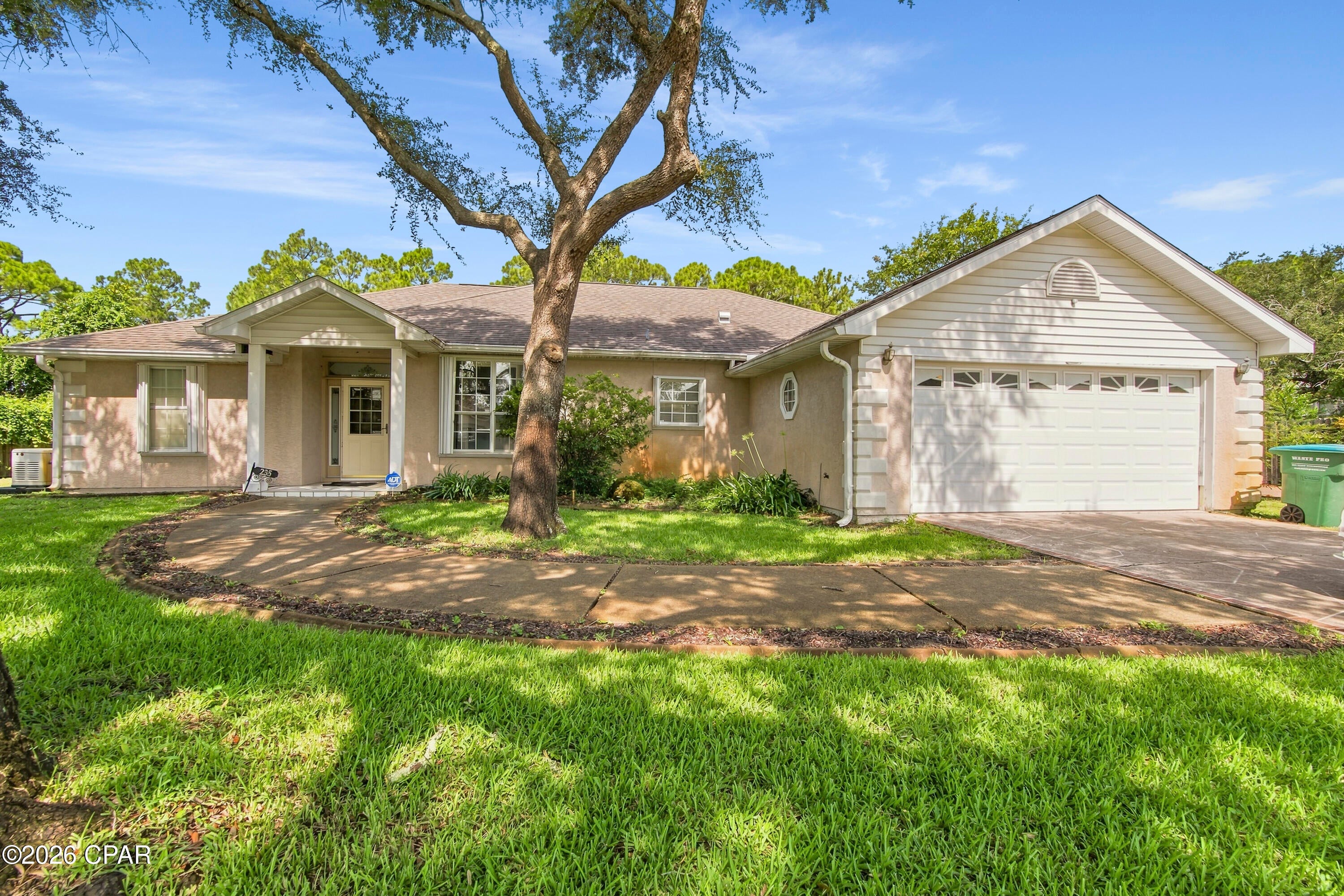 Amazing opportunity to own this ''Diamond in the Rough'' in one of Panama City Beach's most desirable neighborhoods AND at an affordable price!  This home features spacious living room with a wood-burning fireplace and an attached dining area.  The kitchen is open with a breakfast bar, loads of cupboards, and an eat-in dining area.  The split-bedroom plan has a Master bedroom with a walk-in closet that includes stacked shelves, and a Master bath with two separate vanity locations, a Jacuzzi tub, separate shower and a linen closet.  All of the bedrooms are a good size with a Guest bath conveniently located between these two rooms.  From both the Living room and Master bedroom you can access the screened enclosed, wooden-decked patio that takes you to the large backyard.  There is a three-sectioned shed that also includes a workshop.  Additional features include the two-car attached garage with electric open and keypad, 36' wide doorways throughout, foam board exterior walls for energy efficiency, whole-house gas generator, two security cameras, a home security system, leaf gutter protection system, sprinkler system and well, and hurricane shutters.  This home has so much to offer and with a little work, it could be your perfect diamond!