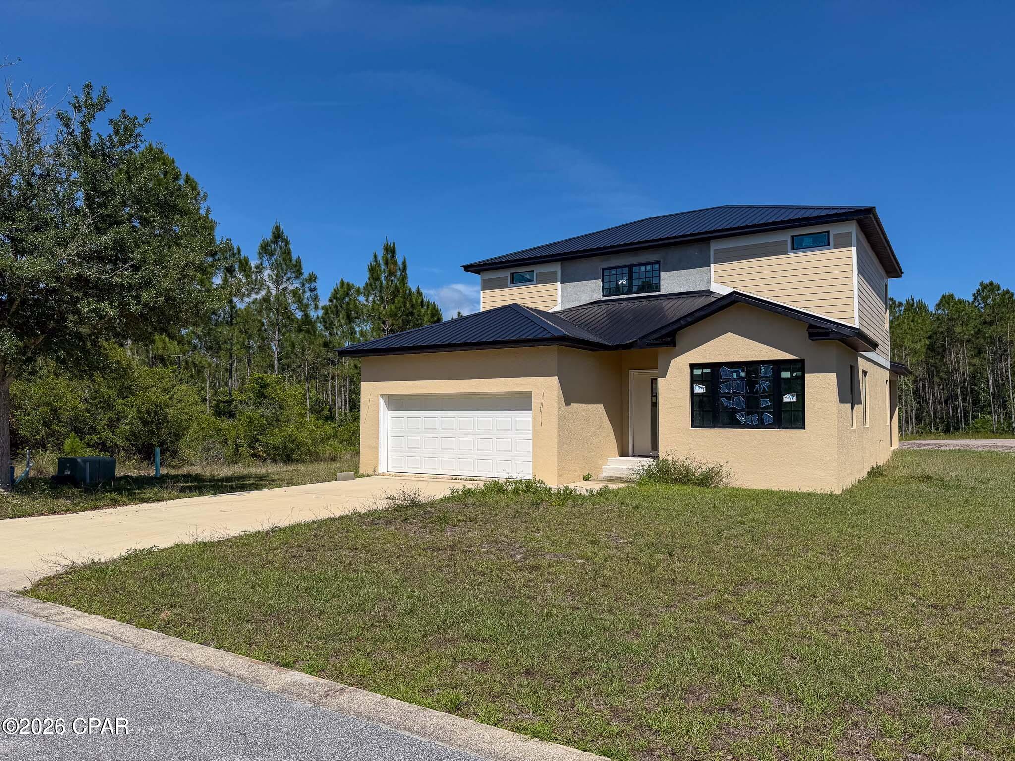 118 Shallow Reed Drive rests in the beautiful and quaint residential community of Shallow Reed where you're just minutes from downtown Port St. Joe and the beaches of Cape San Blas. This home is incomplete and will need completion to receive a CO. Bring your favorite builder/general contractor to finish this stunning floor plan! This home is offered at a discounted price to reflect the needs required to complete construction. Sold As Is. Buyer's responsible for all due diligence. All measurements approximate.