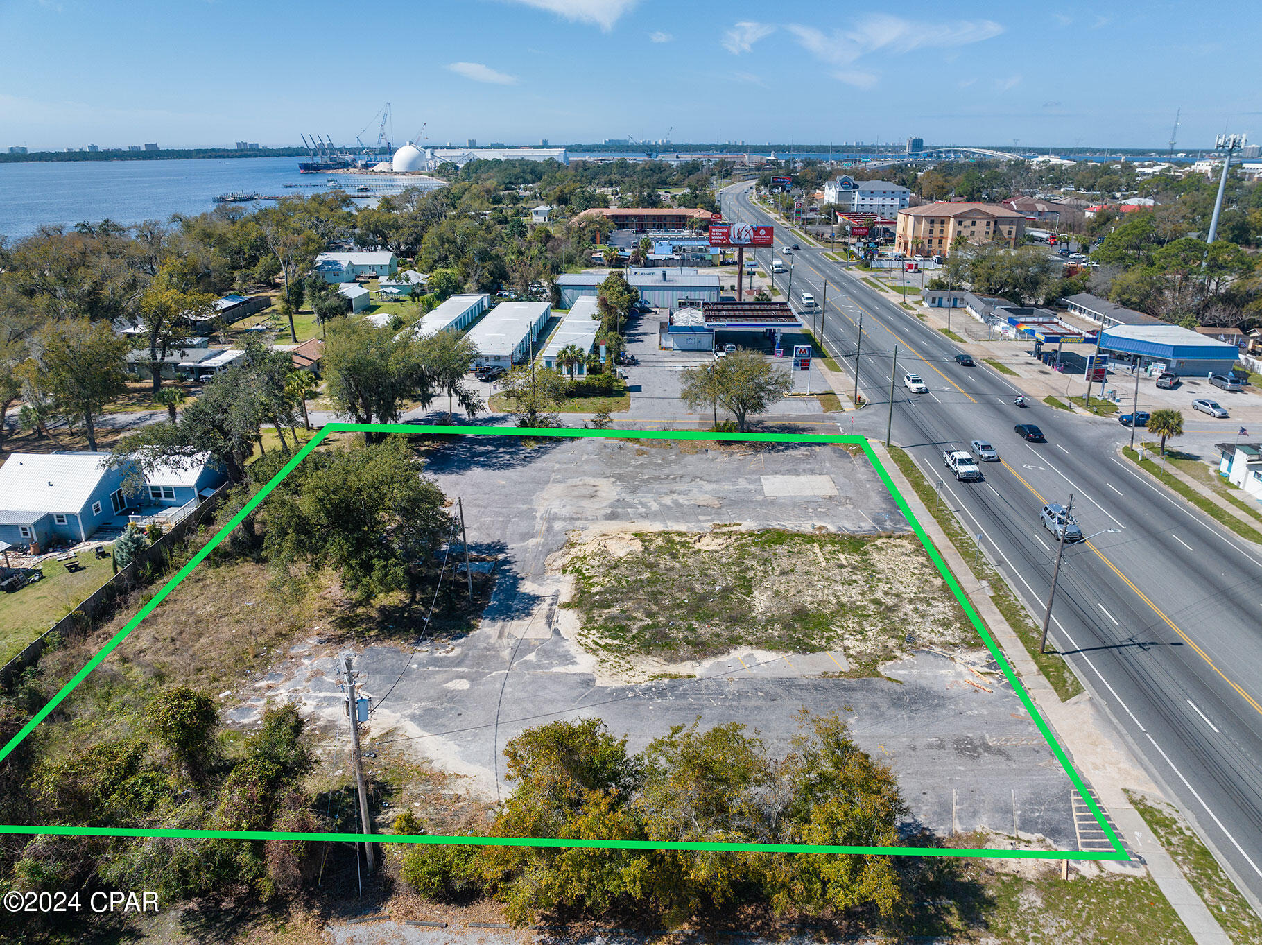 No retention pond required, per Panama City Engineering! Excellent opportunity with 43,500 daily traffic count. Prime location zoned General Commercial. The property has perviously been improved and demolished after the storm, leaving a blank slate for your vision. The existing pavement grandfathers this property in so there is no retention pond required.