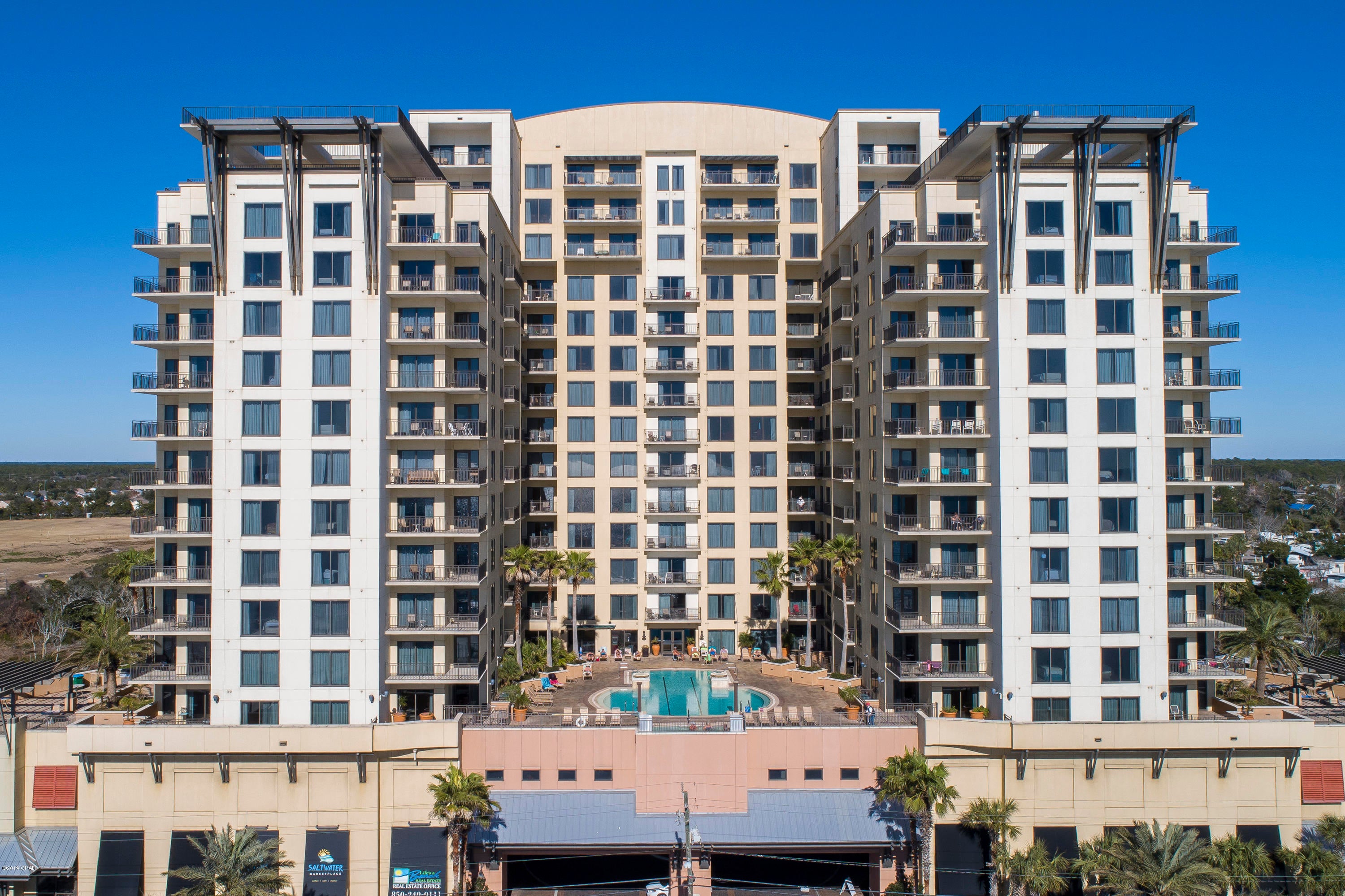 Wow! Rare chance to own this Huge 3 bed, 3 bath corner unit that grossed nearly $54,000 in 2018 with 2019 rentals on the books! Enjoy Gulf views from every room and quick access to the rooftop pool terrace from your private balcony! This condo comes completely furnished and stocked with all the beach essentials! Beautiful granite counters, large eat-in kitchen with stainless appliances & breakfast bar! All rooms come with mounted flat screen TV's, king size beds, closets, and newer carpet! You'll love the master bedroom with private patio, ensuite bath, &  walk-in closet used as storage! Easy access to the elevator and covered parking make vacationing a breeze! Starbucks coffee & beach convenience stores onsite! Only 1 mile to Pier Park! Check reviews @ VRBO# 1009720 and come see it today!