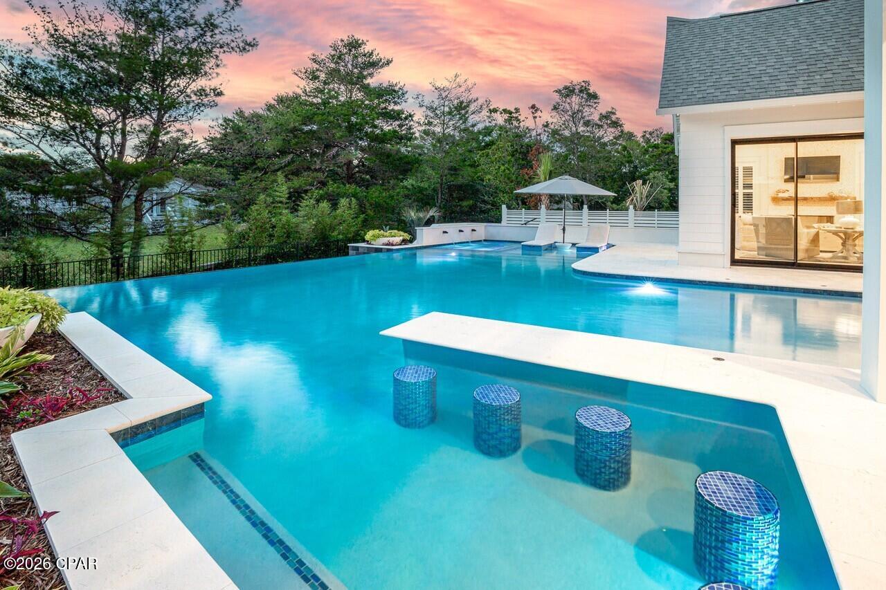 $800,000+ Gross Income 30A Beach Investment
4,524 SF two-story vacation home with 7.5 bedrooms, each with en suite bathroom, (3) living rooms, chef's kitchen, zero entry pool with hot tub, and 1,457 SF unconditioned space.
2025 Gross Rental Income:  $802,457 
2025 NOI:  $594,210
7% CAP rate
VRBO's 2024 Vacation Rental of the Year
Deeded beach access