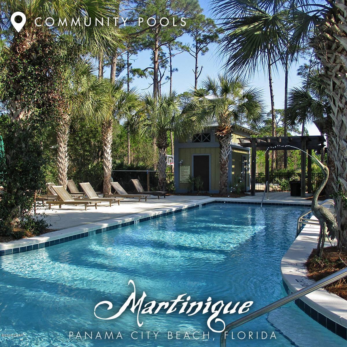 Old Florida Charm in a gated coastal community in Panama City Beach!  Imagine going to your boat at the marina, seafood market for lunch and dinner at one of Florida's Top Restaurants – All by golf cart!  Located just across from Capt. Anderson's Restaurant & Marina and within biking distance to St. Andrews State Park.