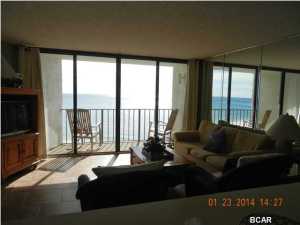 An endless gulf view of the emerald waters from your balcony,white sand below. Amenities on site include heated outdoor pool,lagoon pool,hot tubs,tennis courts,game room,playground fitness center,golf and conference rooms.24/7 gated security,on-site free parking,Boat & trailer parking available,Full service restaurant,Spa & exercise rooms,two beverage bars, Pizza hut, beauty shop, arcade and gift store,shuttle service to golf and tennis venues. All of this available from your condo located near many other shopping areas, restaurants, entertainment and golf courses. Rental revenues for Edgewater units are rewarding,call for details! This unit is fully tiled with 16'' tile. This is a short sale, the sale is contingent upon the short sale lender approving the contract price for the sale