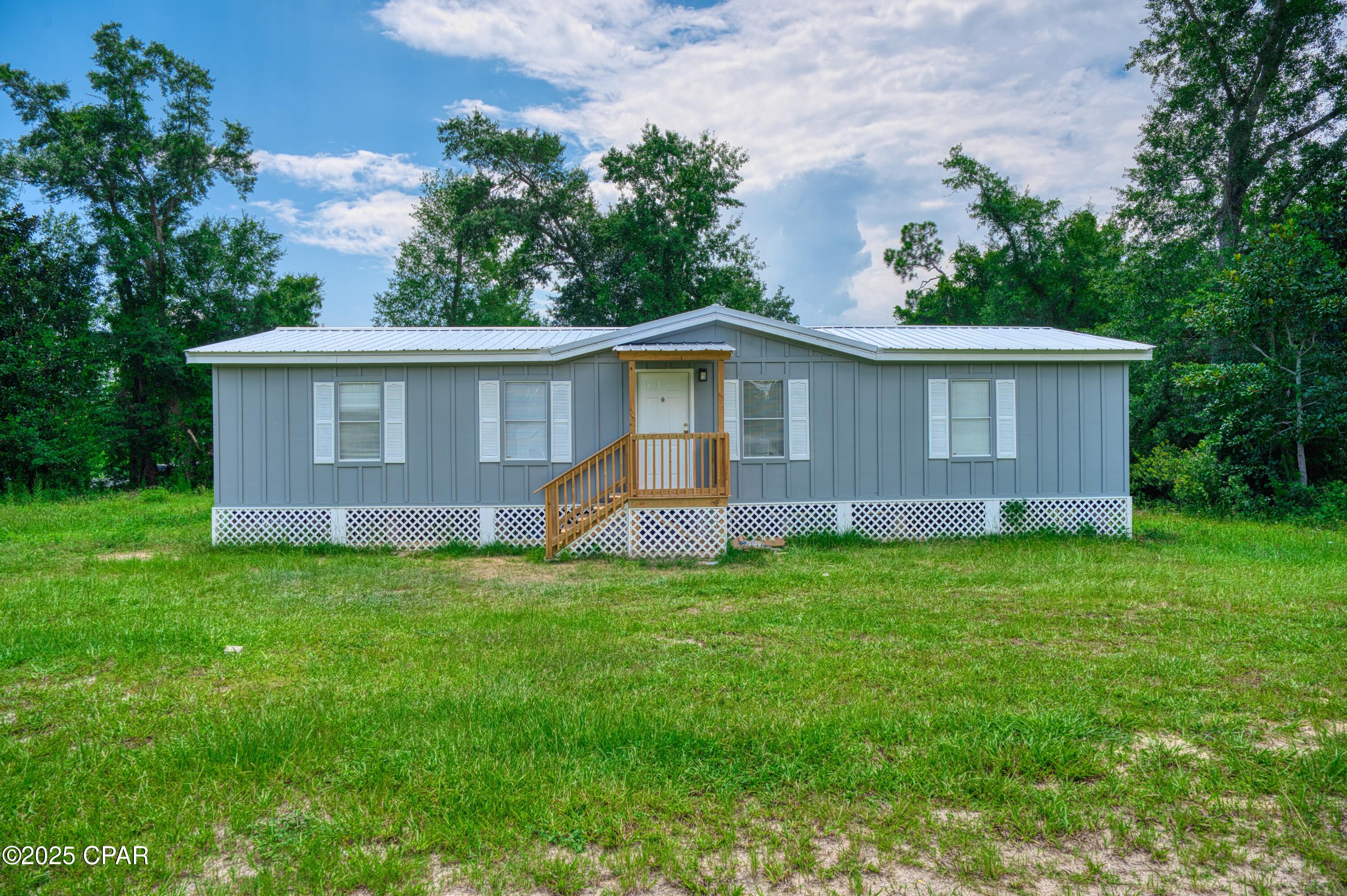 This beautifully renovated 3-bedroom, 2-bathroom home is packed with upgrades and situated on a generous ¼ acre lot — offering comfort, space, and peace of mind.

Inside, you'll find fresh luxury vinyl plank (LVP) flooring, new carpet and a bright, open layout perfect for everyday living. The kitchen is equipped with brand-new appliances, while both bathrooms have been updated to reflect modern tastes and convenience.

Major upgrades include all-new PEX plumbing, new septic, new electrical wiring with a new sub panel, brand-new roof and front deck.

Buyer to verify all measurements