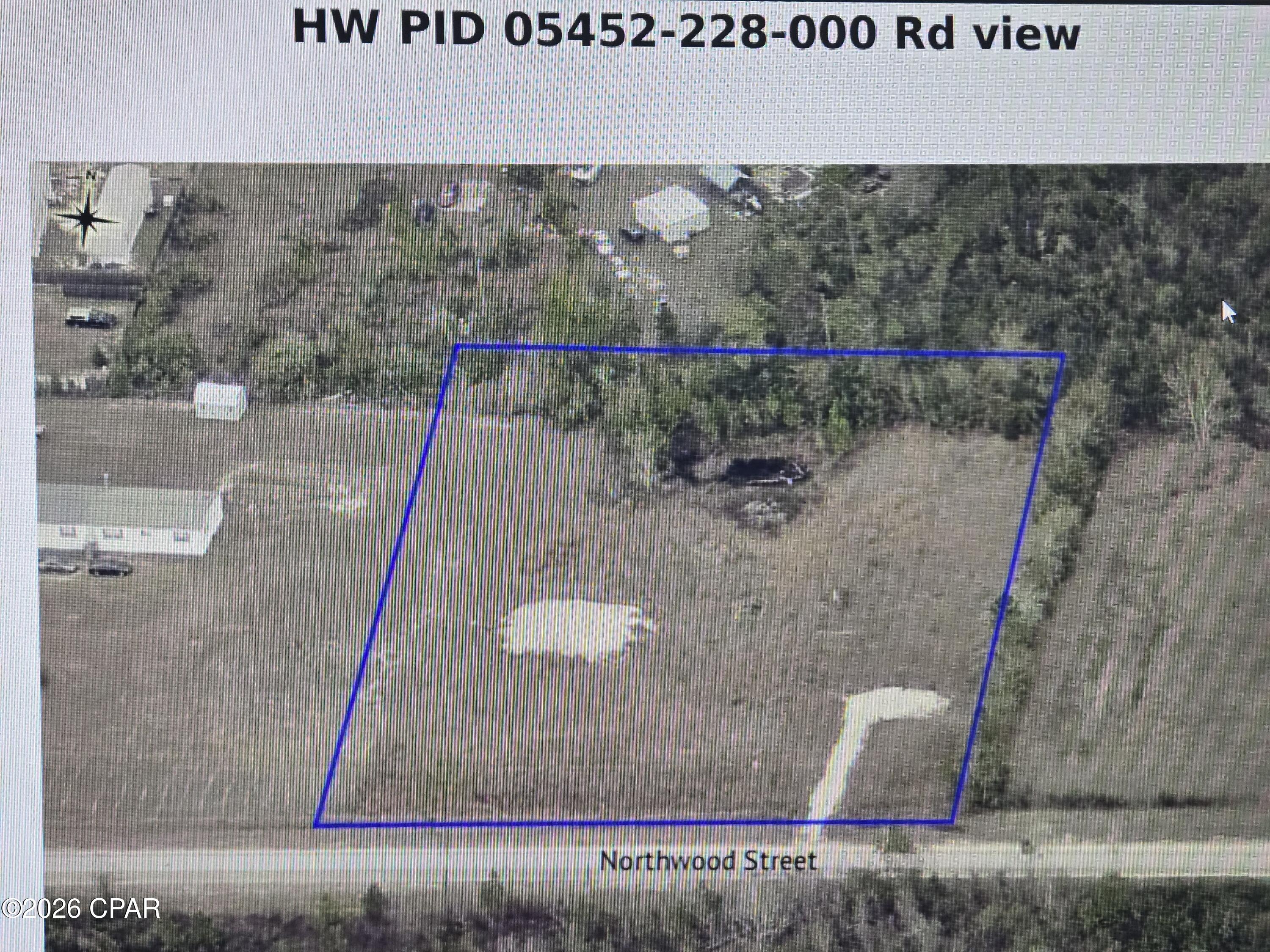 Vacant 1.72 acre parcel with legal access off of Northwood Drive, Youngstown, FL 32466.