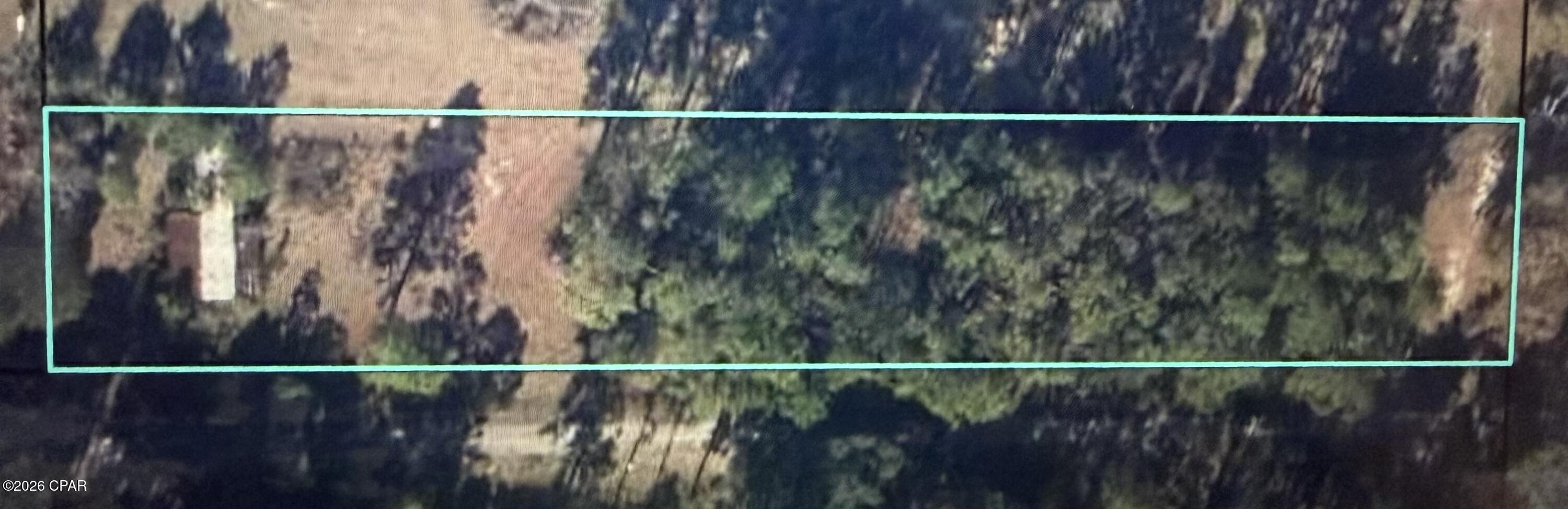 This beautiful partially wooded lot is the perfect canvas for your new home. Great location minutes from the amazing small town of Vernon. Enjoy the convenience of small town living while having Panama City Beaches at your finger tips.
There is an older mobile home on property, it has been given no value.