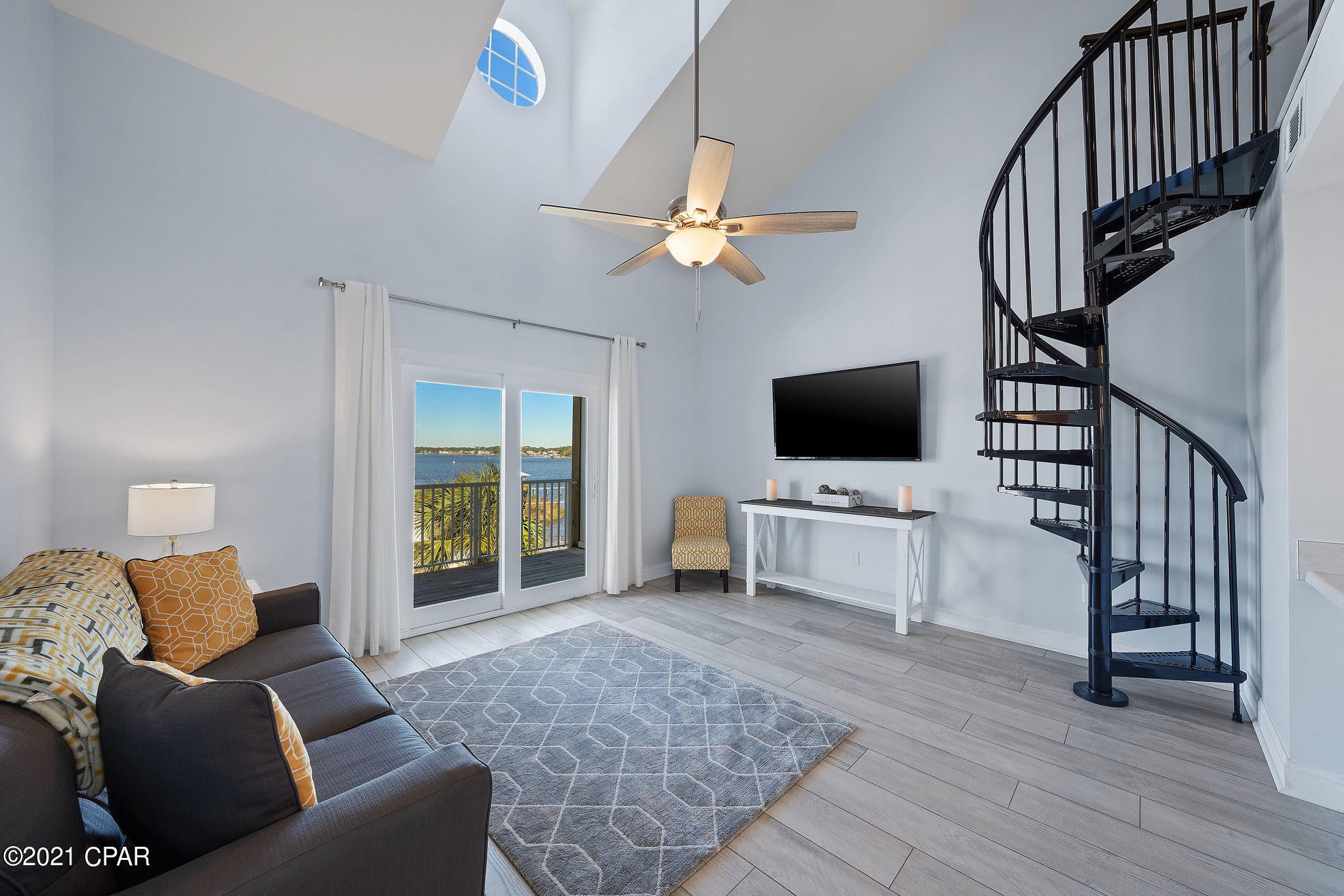 'CURRENTLY UNDER CONTRACT, SELLER ACCEPTING BACKUP OFFERS. Welcome to your New 1BR/1BA Beach Condo, with a loft, located in the quiet, waterfront community of Treasure Cove, overlooking the Lagoon, and just minutes away from the Gulf of Mexico! Enjoy peaceful waterviews of the Lagoon from your main living areas, the second-level loft and your unit's private balcony.  This Panama City Beach condo is beautifully updated, with new spiral staircase, new Luxury Vinyl Plank flooring, new windows and doors, new HVAC. Enjoy the stunning sunsets over the Lagoon from your private balcony, which also overlooks the community pool and community dock. This property can be used as a primary home, vacation home or investment property. Located in the waterfront community of Treasure Cove, which offers both Resort style amenities including a community pool and community dock on the Lagoon, yet it is also a quiet, residential setting.  This condo is located on South Lagoon, across the street from Pirate's Cove Marina, just quick boat ride to Shell Island and the Gulf of Mexico, and in close proximity to the St Andrews State Park, the Navy Base, shopping, dining and water sports activities. Low association fees and new project facility updates include new roof, new siding, new paint, new windows and doors, and new community dock. This unit is also wired for Nest doorbell camera, Nest doorlock, and Nest thermostat which are all controllable from your smart phone. Call today to see this beach condo in person!
