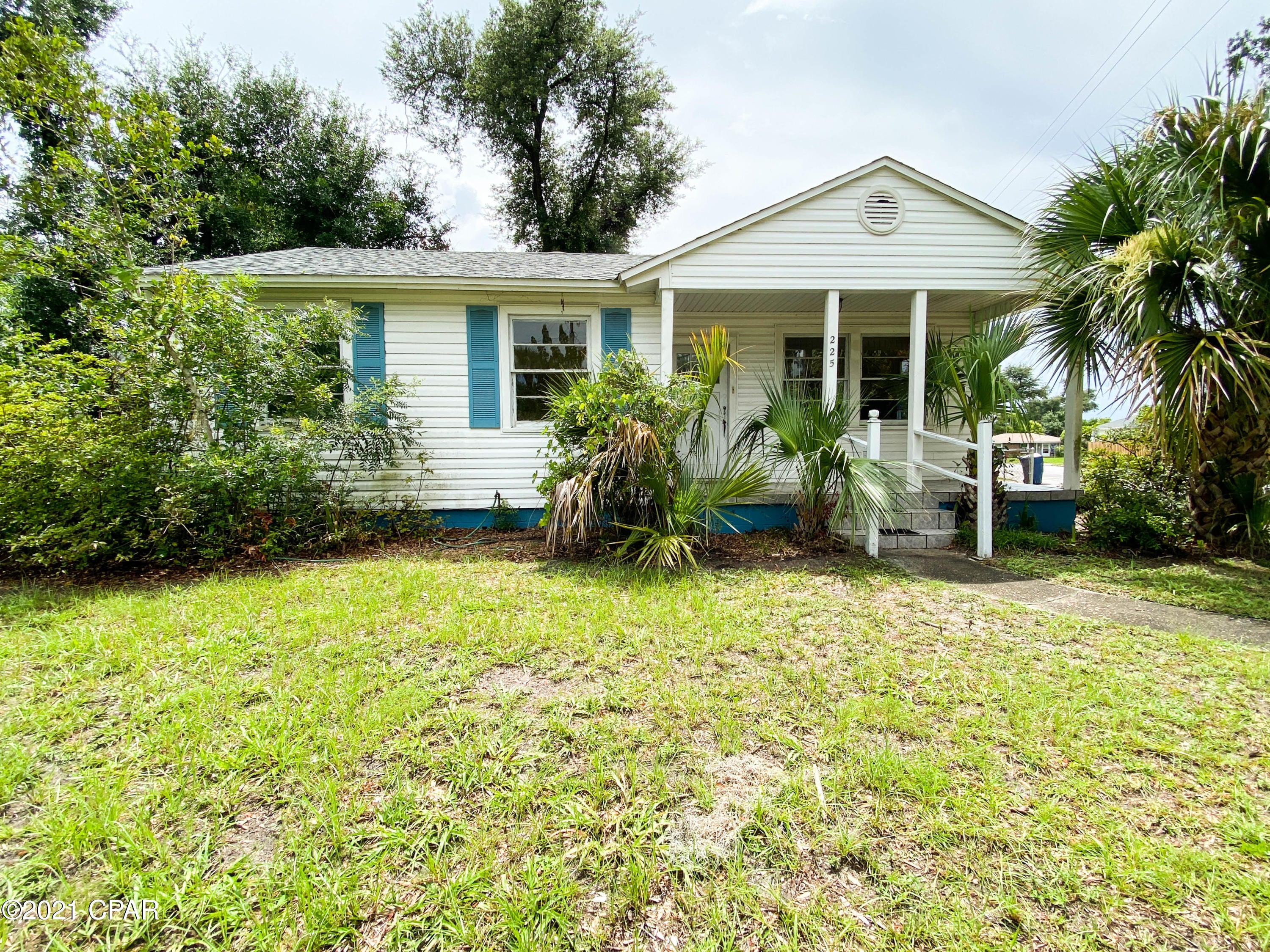 Attn Investors!!  Adorable cottage on a corner lot in the Cove with brand new roof, brand new water heater and brand new HVAC.  Home can be lived in now and just needs a little love.  Hardwood floors are in good shape.  Home has a detached building with washer/dryer hook-ups that has a new roof.  This home would be a great family home or rental!