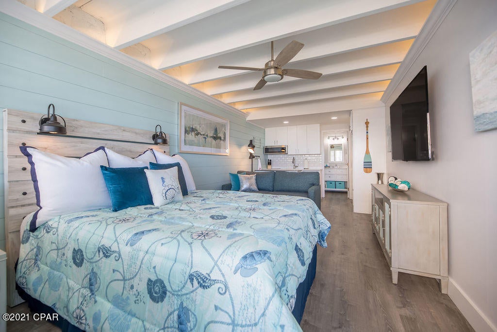 'CURRENTLY UNDER CONTRACT, SELLER ACCEPTING BACKUP OFFERS. Fantastically remodeled, west facing, 4th floor unit for sale! One of the last remaining opportunities to purchase property directly on the World's Most Beautiful Beaches under 300k, this unit is a very strong renter and has been totally upgraded for a great modern feel. Shiplap walls, upgraded countertops and kitchen appliances, tiled backsplash, new bathroom vanity and tiled shower.... the most was made out of every available foot of this space! Do not miss this opportunity to own in one of the most iconic buildings right on Panama City Beach!!
