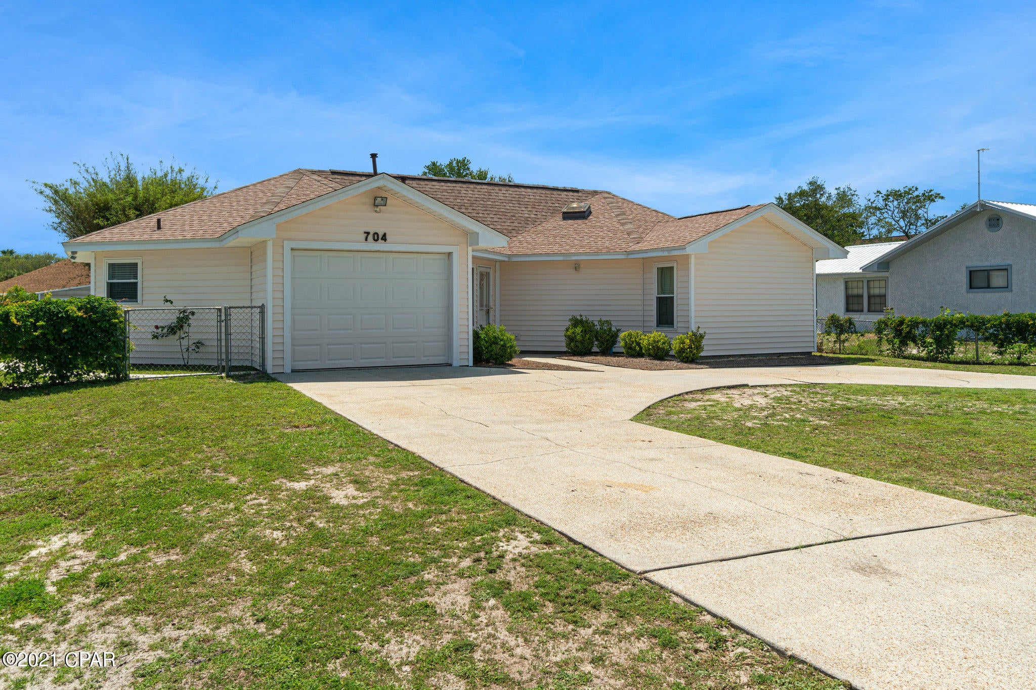 This home has been completely updated top to bottom over the last few years. New roof, A/C, water heater , etc. The interior features open floorplan in main living areas with travertine floors in all main areas. All 3 bedrooms feature luxurious wood floors. Master bedroom has plenty room for a seating area or a work station and double closets. There is a big custom walk-in shower with glass shower doors in the hallway bathroom. The sliding glass door in the living room overlooks the back covered porch and the fenced back yard with a yard building. The lot is huge and parking for lots of vehicles as this home has a circular driveway with a 1 car garage. All information is believed to be correct but should be verified by the Buyer.