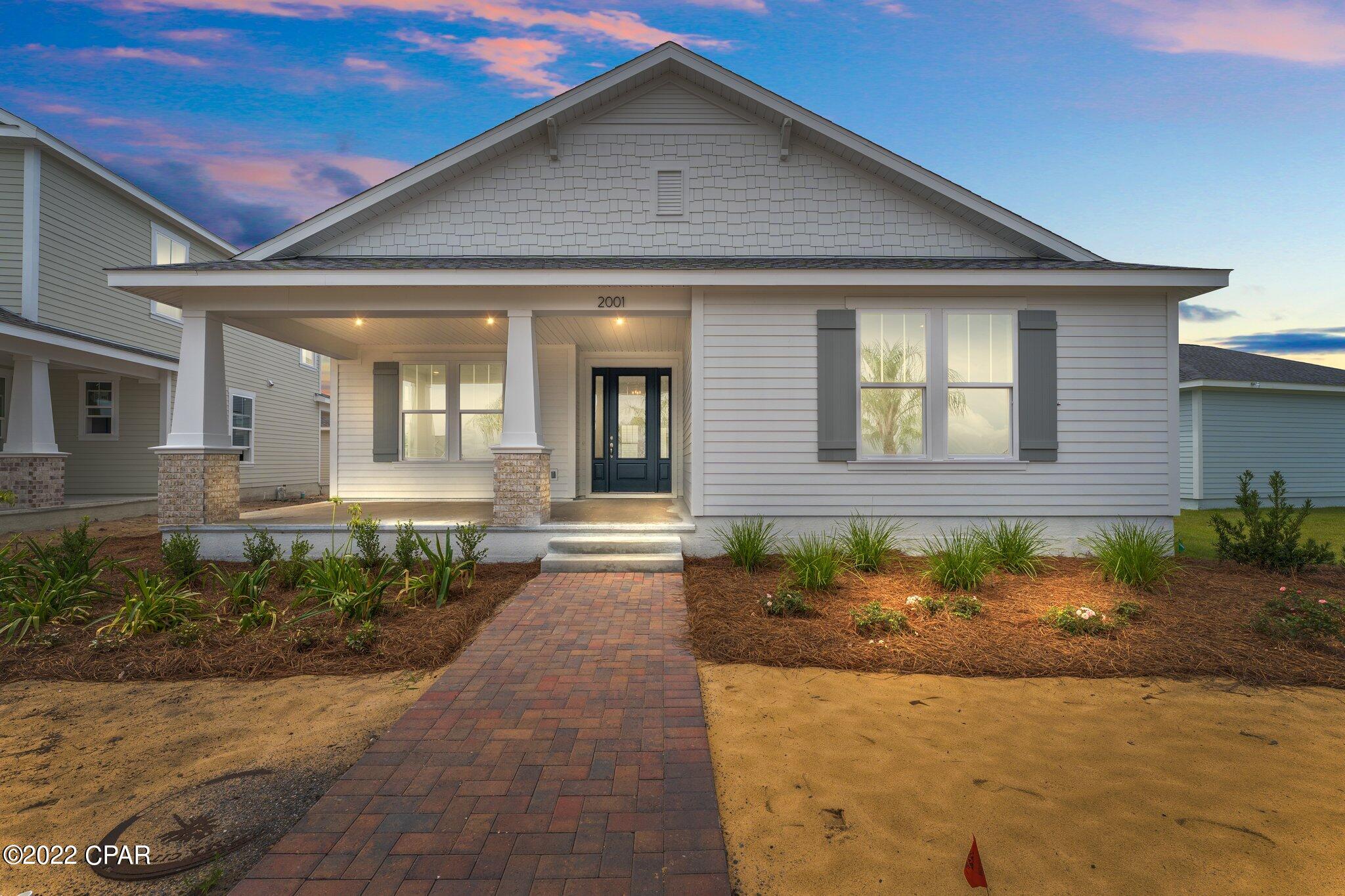 Entered for comp purposes only. This Marco I floor plan is the largest one-story home SweetBay offers with an added carriage house!  If you need space and are tired of stairs, this is it! The kitchen showcases granite countertops, tasteful backsplash, recessed lighting, stainless steel appliances, and a spacious pantry. The master bedroom is a split bedroom and has a double vanity, tiled shower, and bathroom walk-in closet. This home also offers a front and back porch! SweetBay's beautiful sparkling community pool is lighted, has waterfalls, and a lane line for laps. The community also features a basketball court. A planned town center will give you reasons to never leave the community when you get home at night.