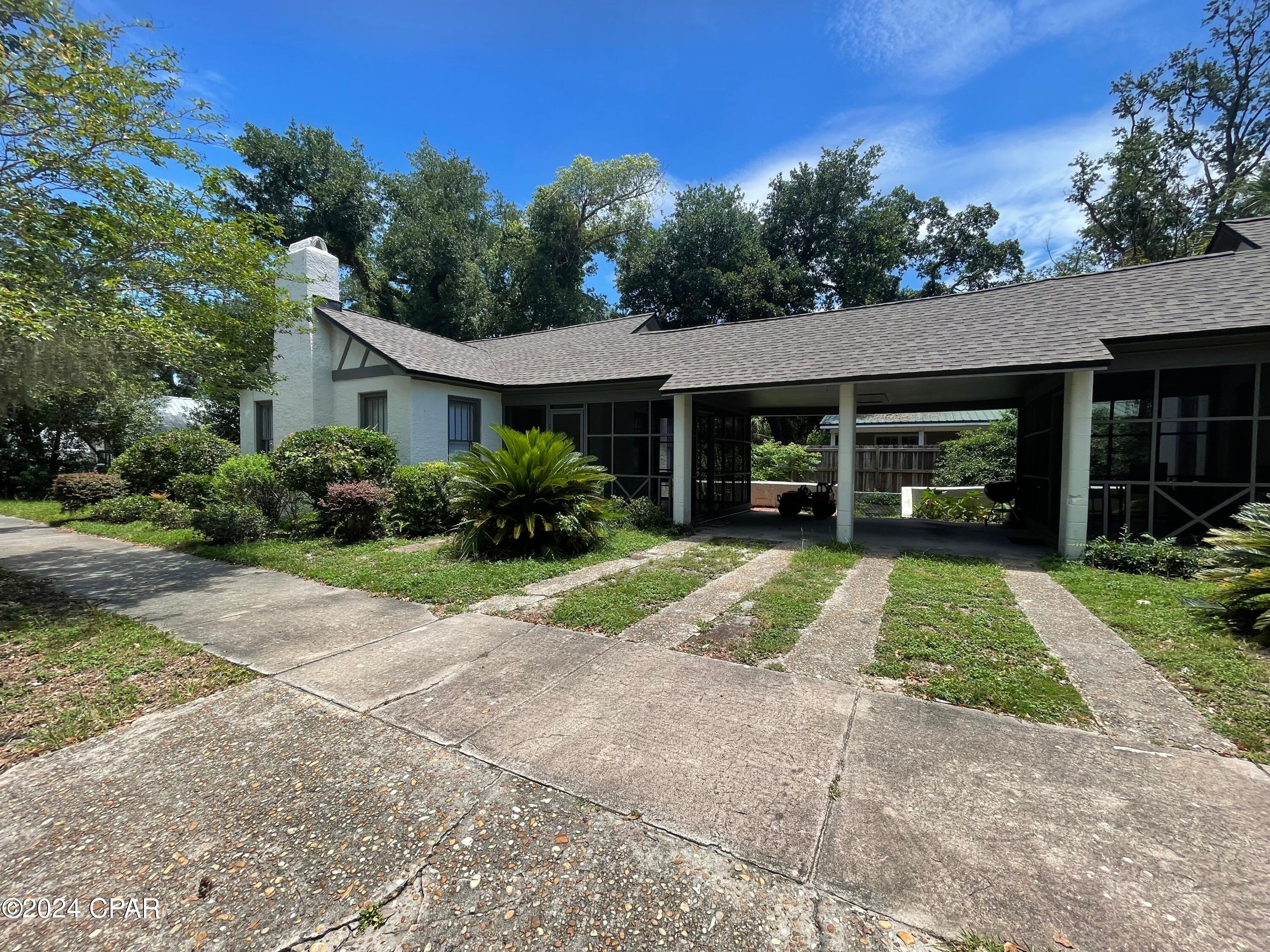 This ADORABLE Bungalo is located in the Historic Cove District, just a short walk to downtown Panama City.  Don't let the year built fool you - this property has been cared for and updated over the years.  The home features living room, dining area, kitchen and a bedroom large enough for your king sized bed.  There is also a screened porch area to enjoy your morning coffee, and stroll down just 1 block to the bay to enjoy the evening sunsets.