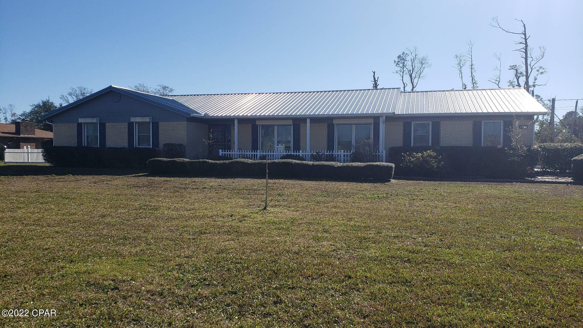 Large 3 Bed 2 Bath home in Callaway with 2 car garage, hardwood flooring & tile, washer/dryer hookups, walk-in closets and brick patio. Spacious lot is maintained by the owner and is fully fenced - perfect for enjoying the beautiful Florida weather. **Fireplace is non-functional.